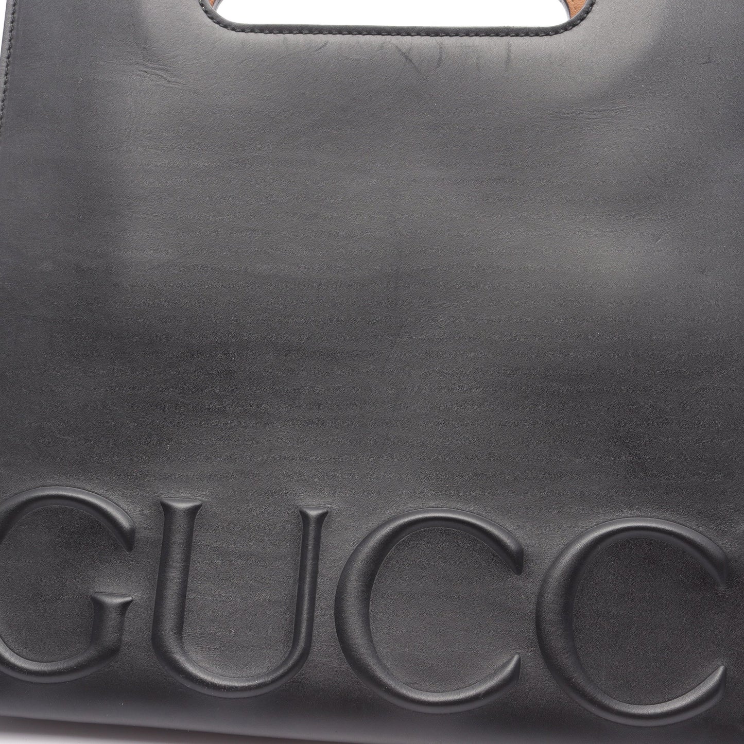 ハンドバッグ エンボスロゴ レザー ブラック グッチ バッグ GUCCI