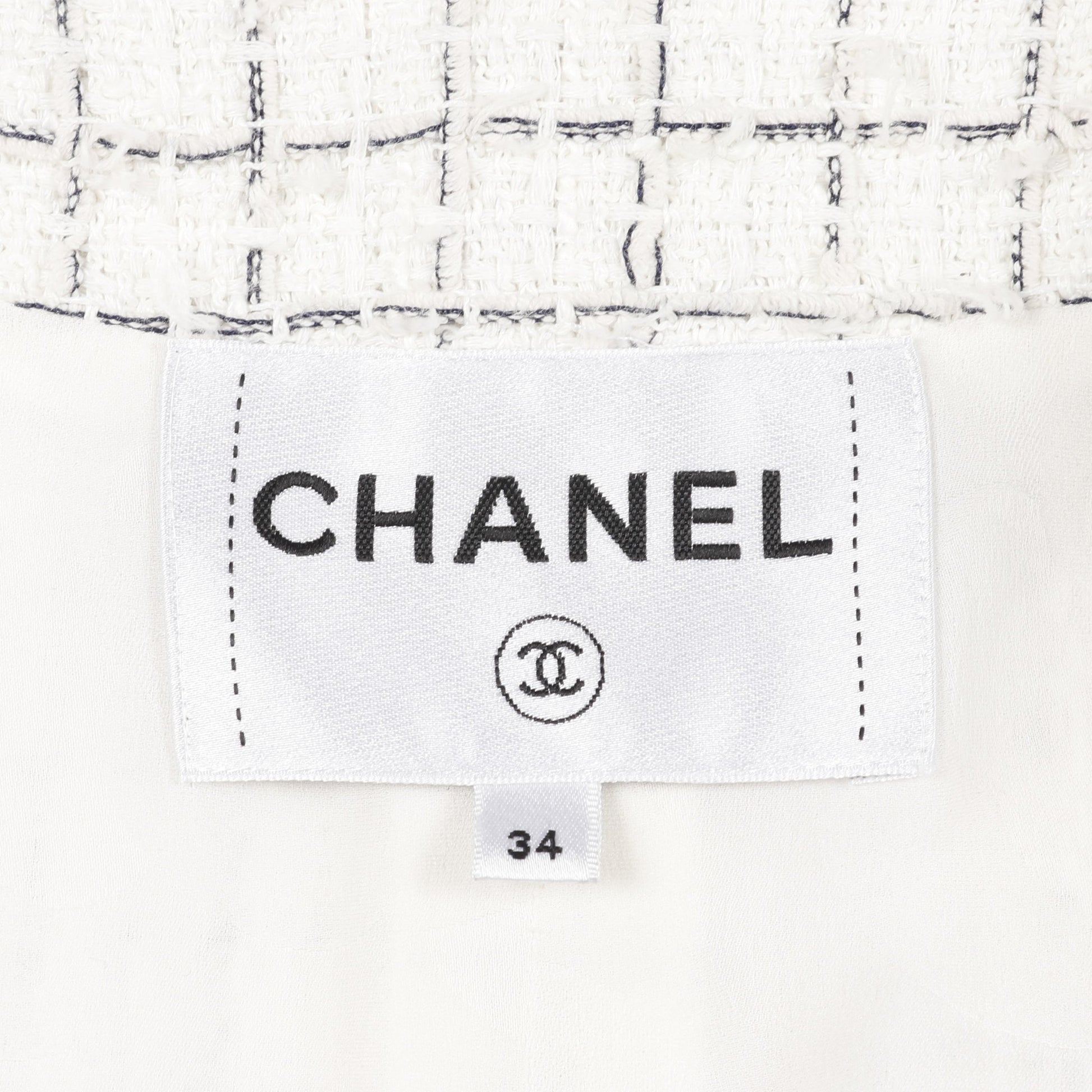 ココマークボタン ツイード ノーカラージャケット コットン ホワイト ブラック スパンコール シャネル アウター CHANEL