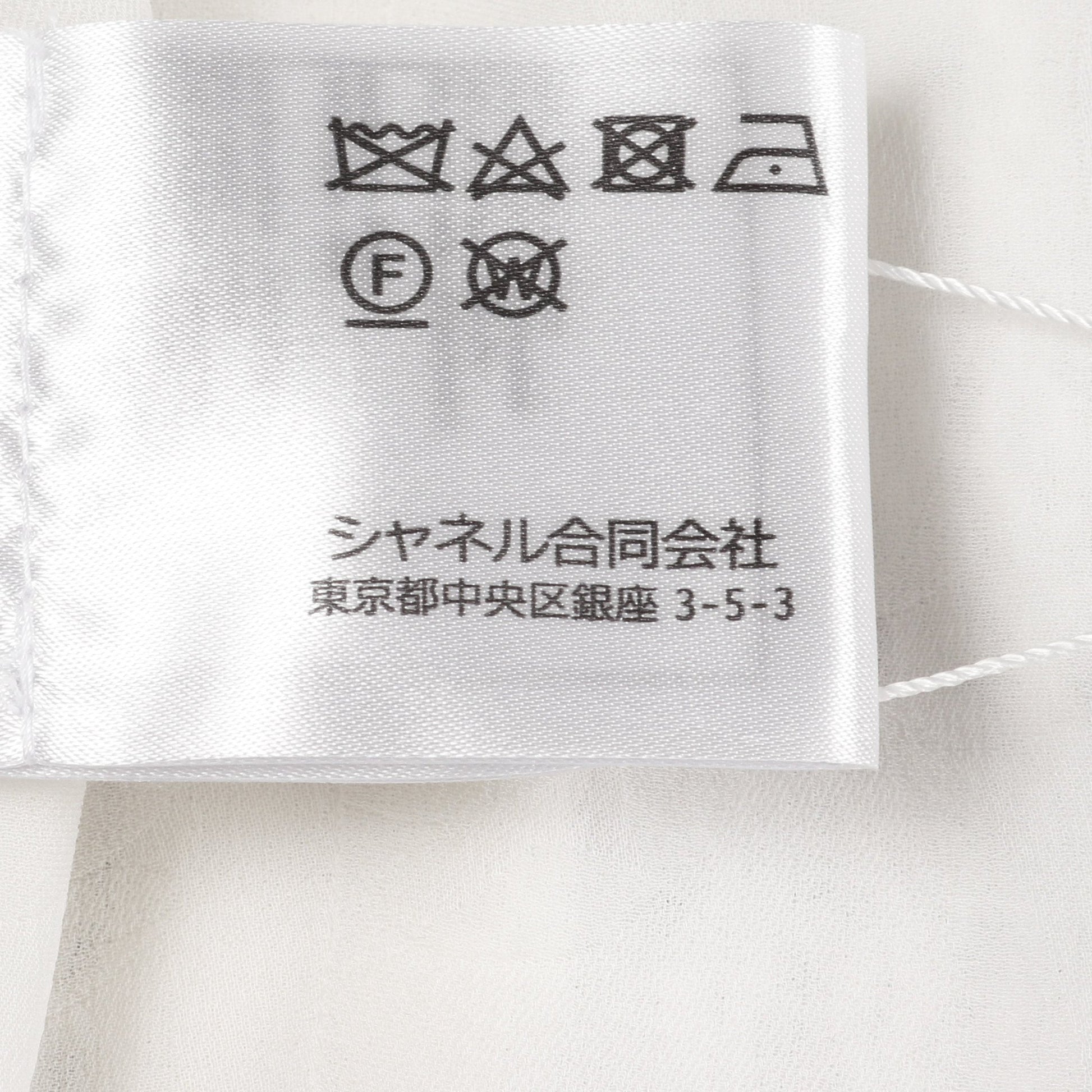 ココマークボタン ツイード ノーカラージャケット コットン ホワイト ブラック スパンコール シャネル アウター CHANEL