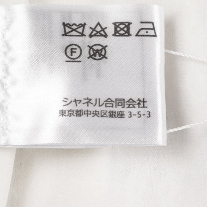 ココマークボタン ツイード ノーカラージャケット コットン ホワイト ブラック スパンコール シャネル アウター CHANEL
