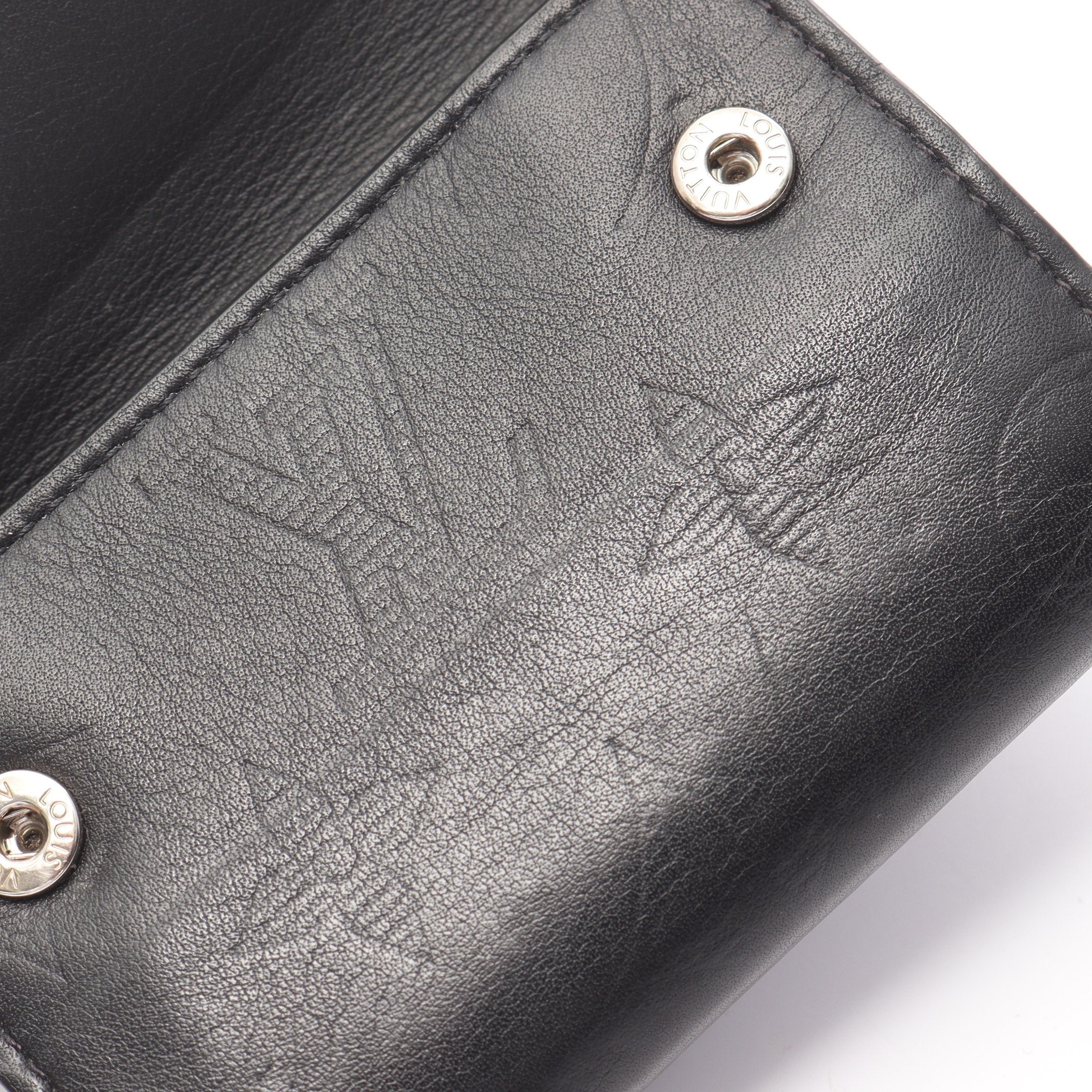 ディスカバリー コンパクト ウォレット モノグラムシャドウ 三つ折り