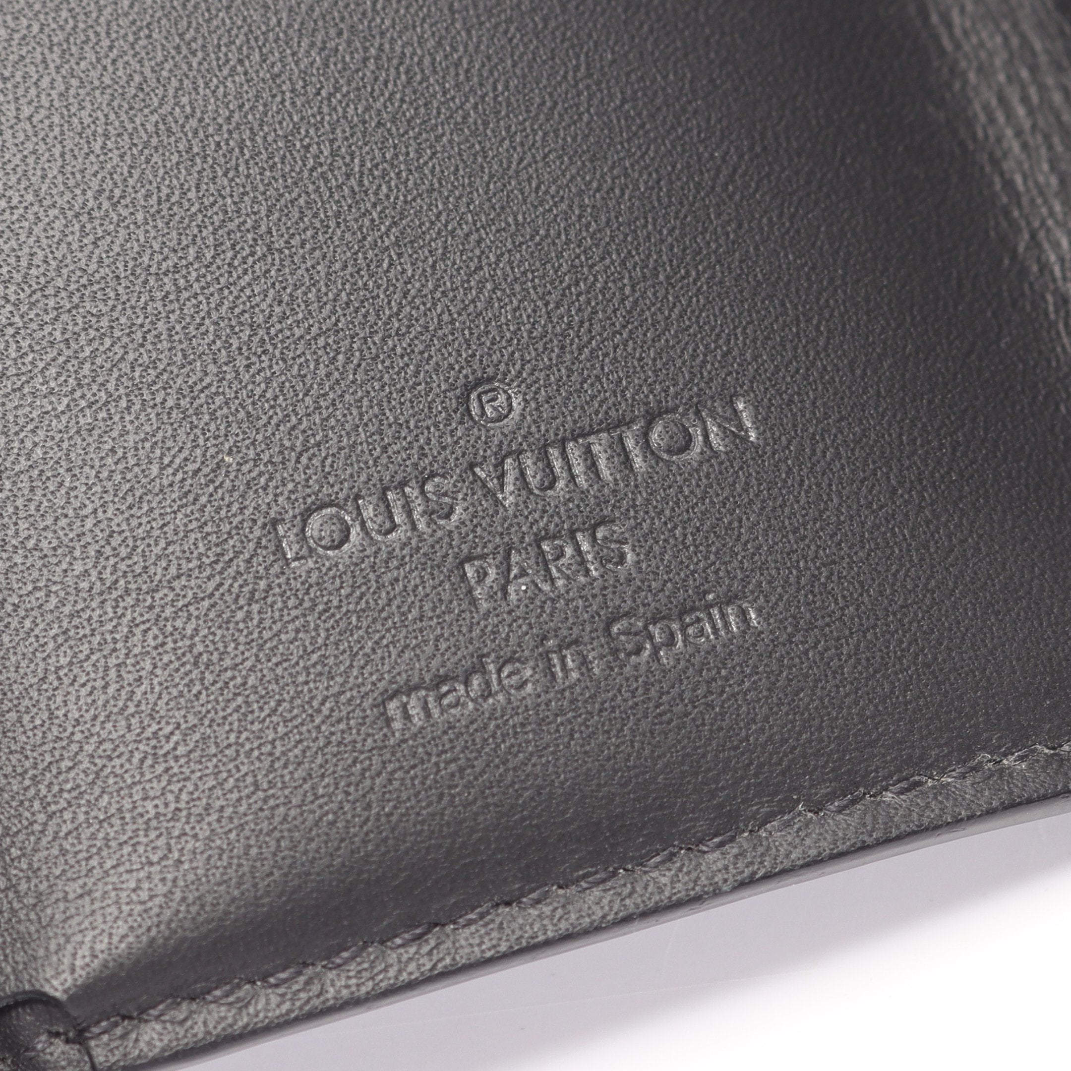 ディスカバリー コンパクト ウォレット モノグラムシャドウ 三つ折り