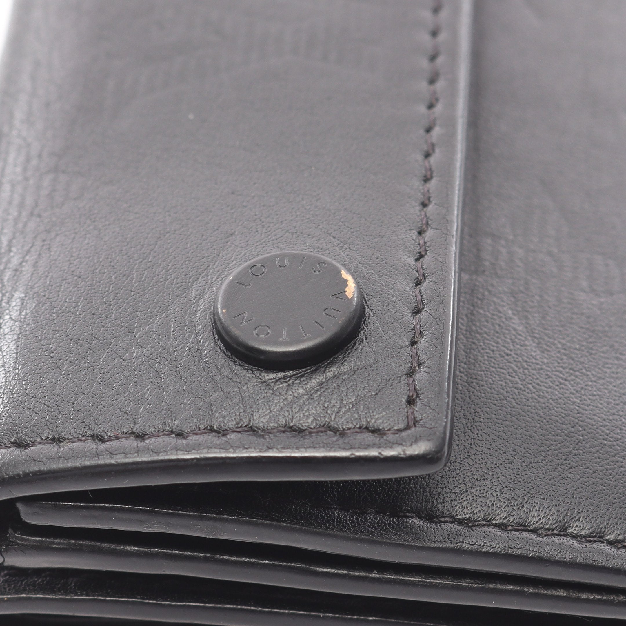 ディスカバリー コンパクト ウォレット モノグラムシャドウ 三つ折り