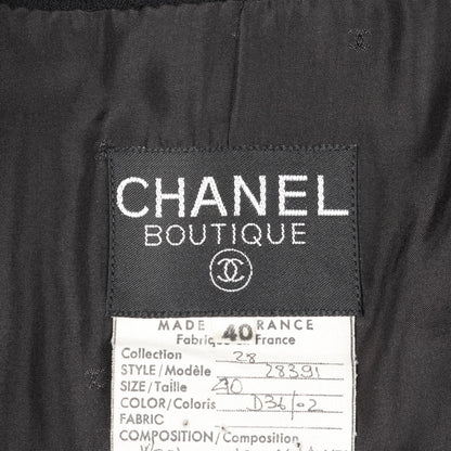カメリアボタン ノーカラージャケット セットアップ スカートスーツ ウール シルク ブラック シャネル スーツ CHANEL