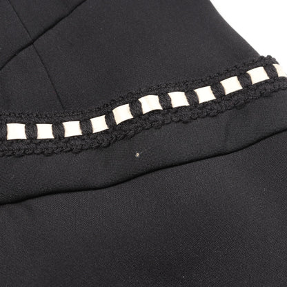 カメリアボタン ノーカラージャケット セットアップ スカートスーツ ウール シルク ブラック シャネル スーツ CHANEL