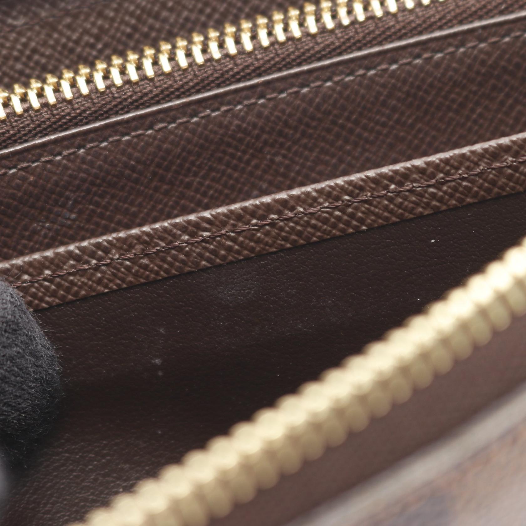 ジッピーウォレット ダミエエベヌ ラウンドファスナー長財布 PVC