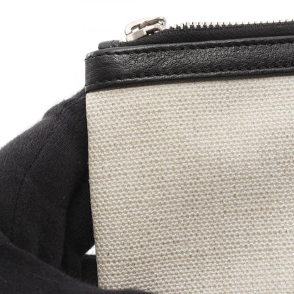 RIVE GAUCHE リヴ ゴーシュ クラッチバッグ キャンバス レザー アイボリー ブラック サンローランパリ バッグ SAINT LAURENT PARIS