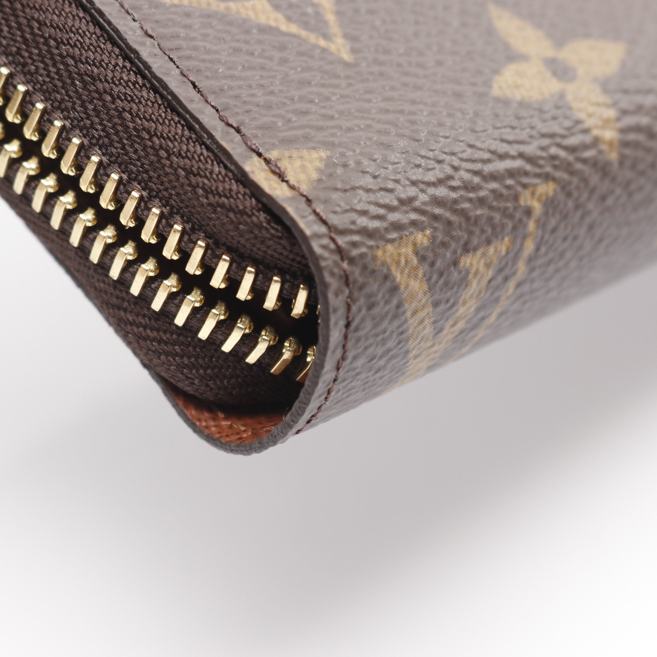 ジッピーウォレット モノグラム ラウンドファスナー長財布 PVC