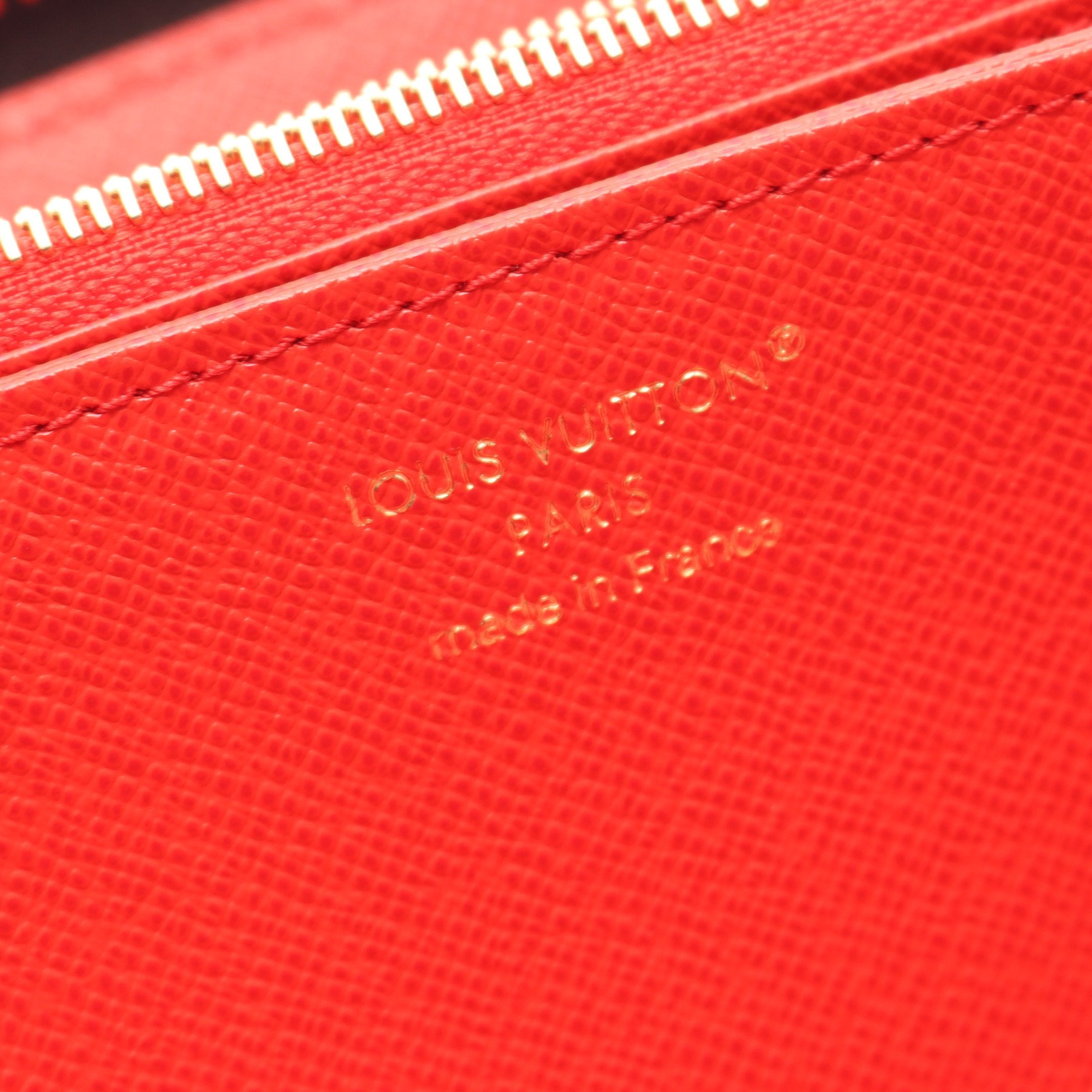 ジッピーウォレット モノグラム コクリコ ラウンドファスナー長財布