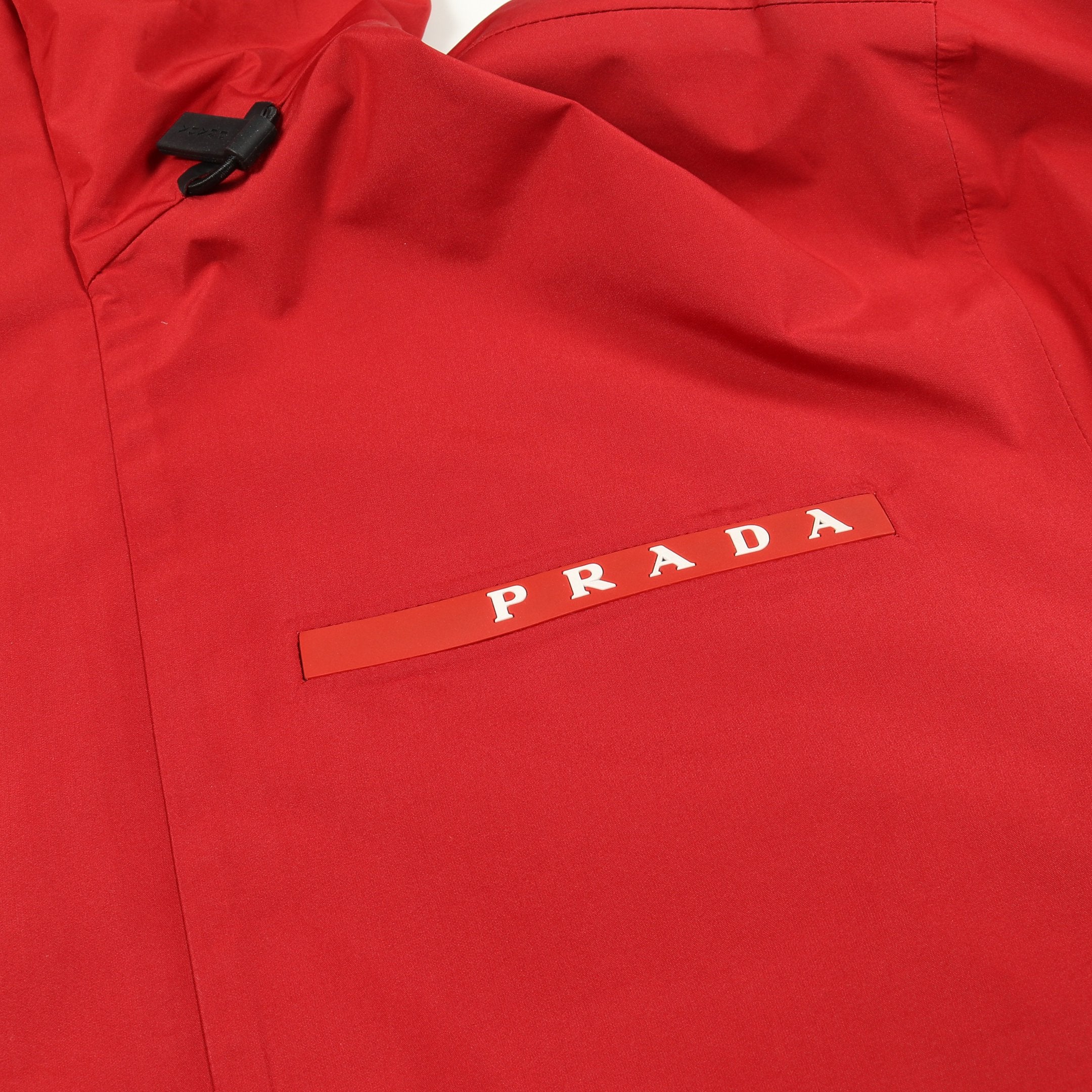 プラダスポーツ パーカー サイズM - レッド PRADA SPORT（プラダスポーツ）マウンテンパーカー 赤 サイズ:M メンズ