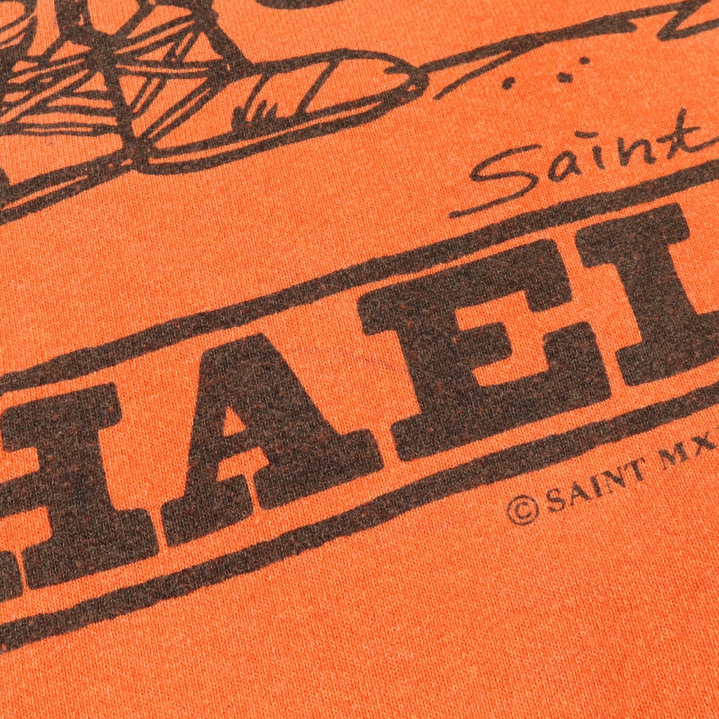 スウェットシャツ クルーネック プリント コットン オレンジ ヴィンテージ加工 ユーズド加工 セント マイケル トップス SAINT MICHAEL