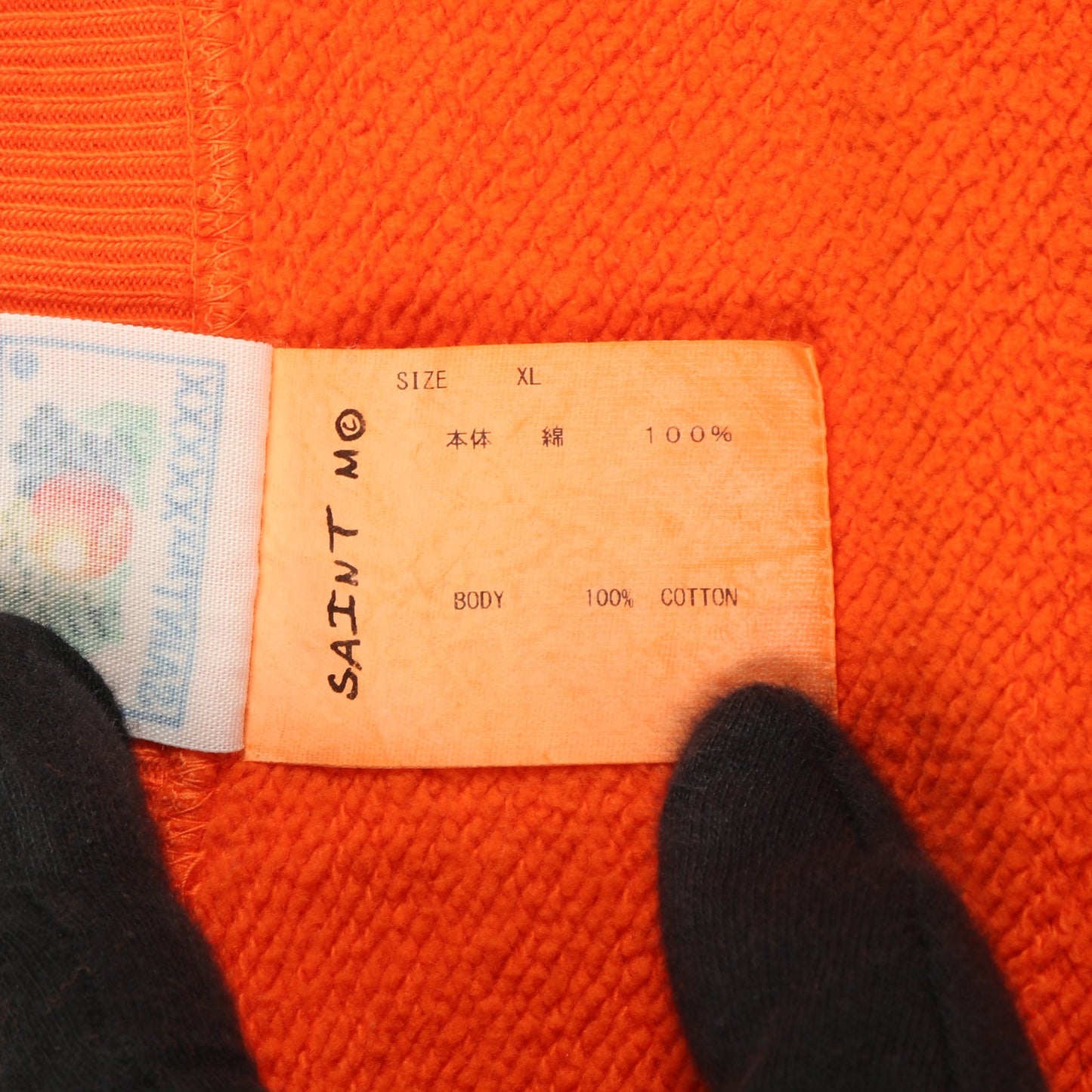 スウェットシャツ クルーネック プリント コットン オレンジ ヴィンテージ加工 ユーズド加工 セント マイケル トップス SAINT MICHAEL