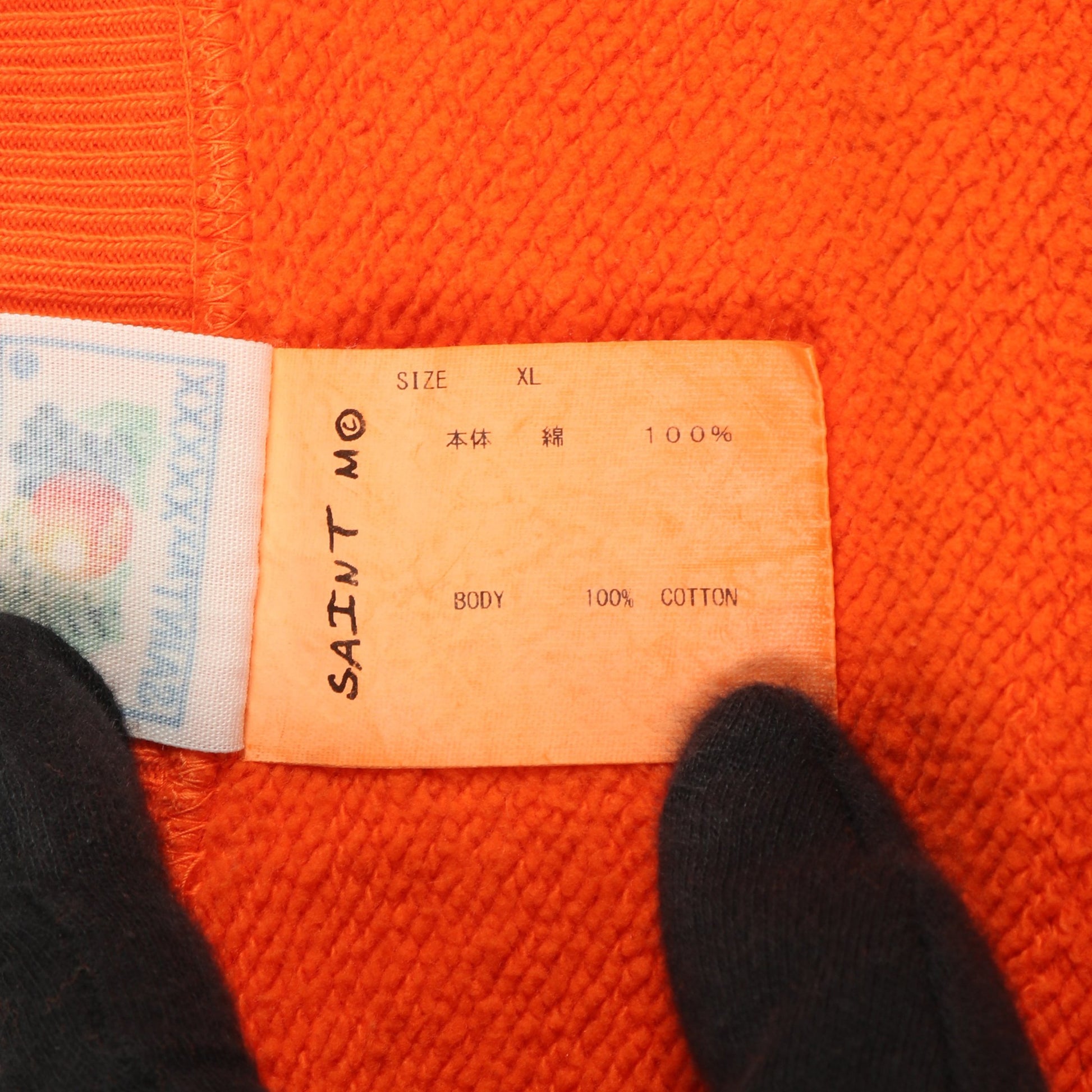 スウェットシャツ クルーネック プリント コットン オレンジ ヴィンテージ加工 ユーズド加工 セント マイケル トップス SAINT MICHAEL