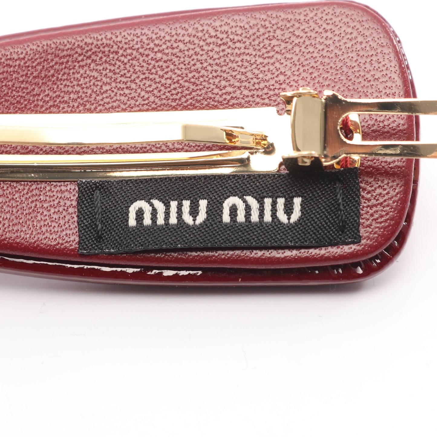 ヘアクリップ バレッタ エナメルレザー ボルドー ミュウミュウ アクセサリー miu miu