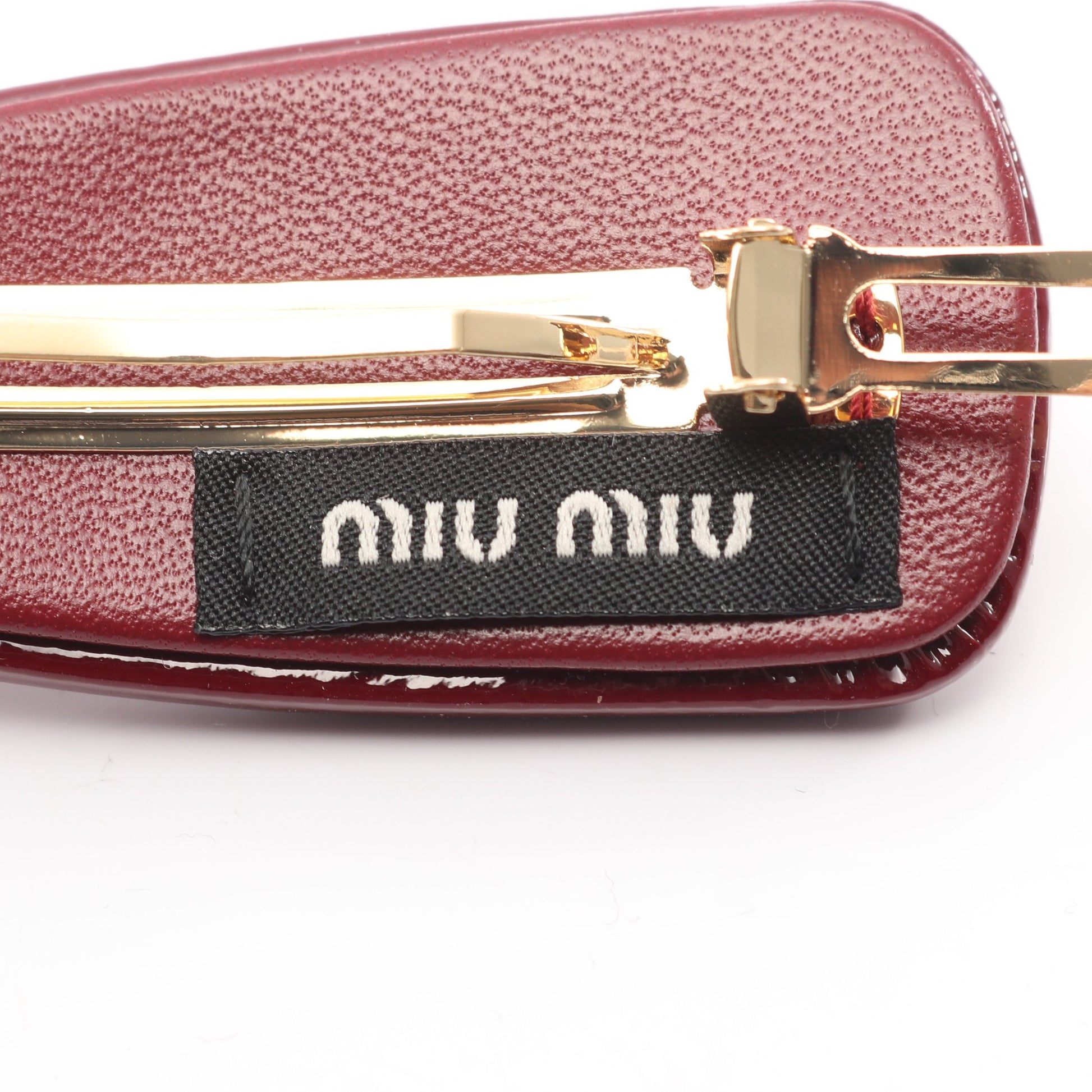 ヘアクリップ バレッタ エナメルレザー ボルドー ミュウミュウ アクセサリー miu miu