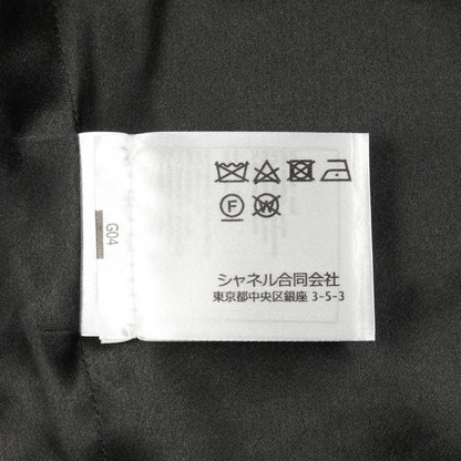 ビジューライオンボタン イリディッセント ウール ツイード ダブルブレスト コート チェック ウール ナイロン レーヨン ネイビー ブラック 24AW シャネル アウター CHANEL