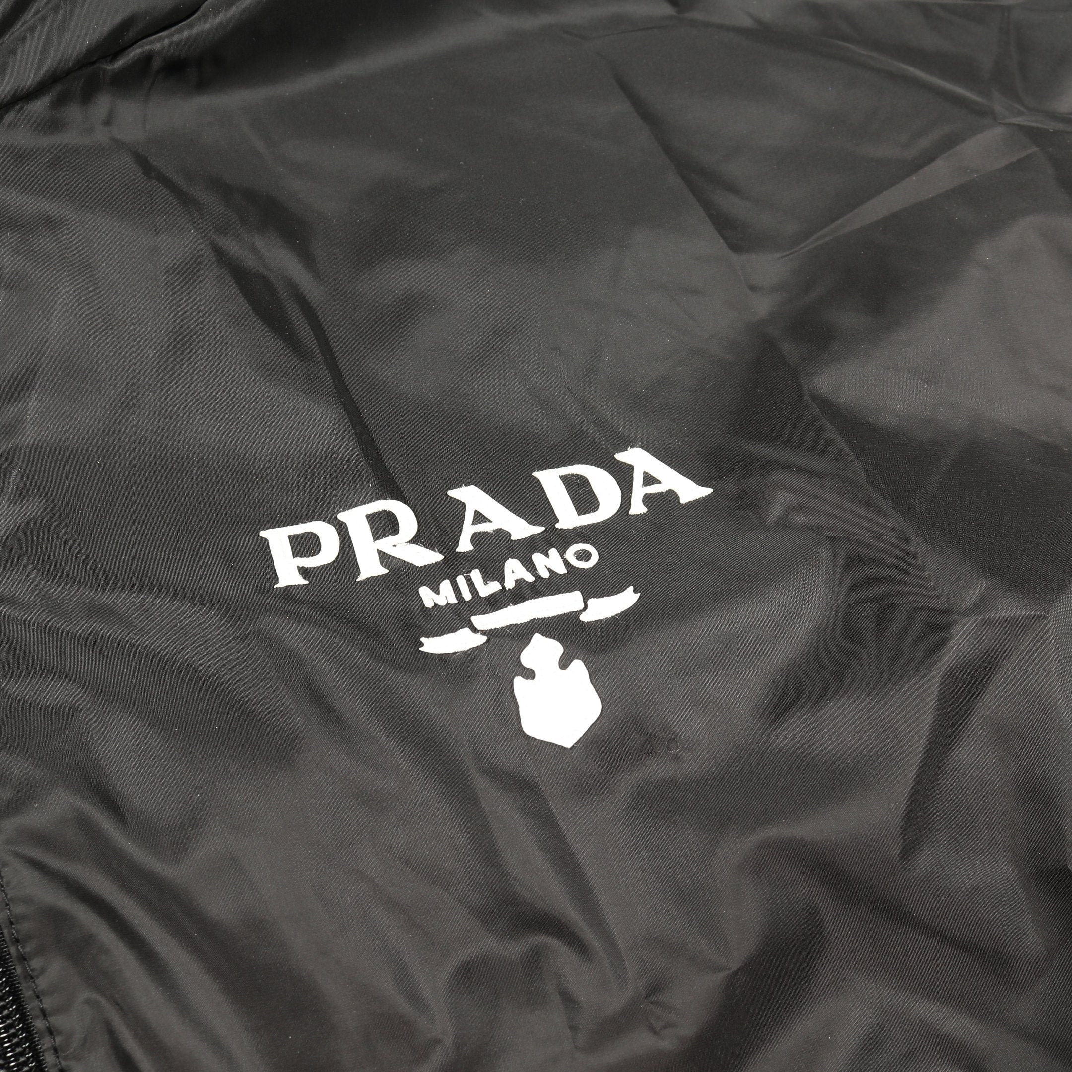 プラダのロゴ入りレインコート Prada Re-Nylon ライト レインコート 通販 - FARFETCH