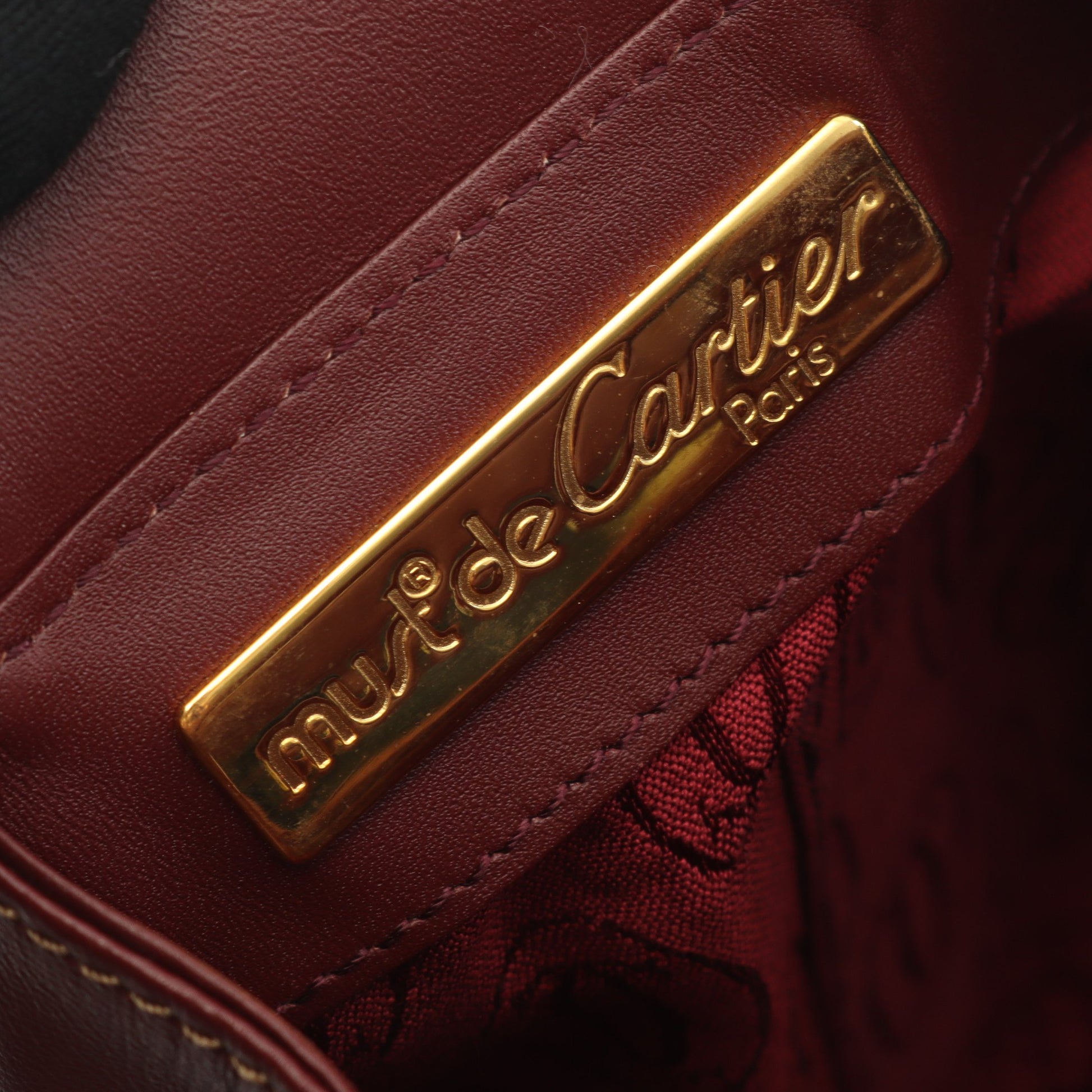 マストライン ショルダーバッグ レザー ボルドー 巾着 カルティエ バッグ Cartier