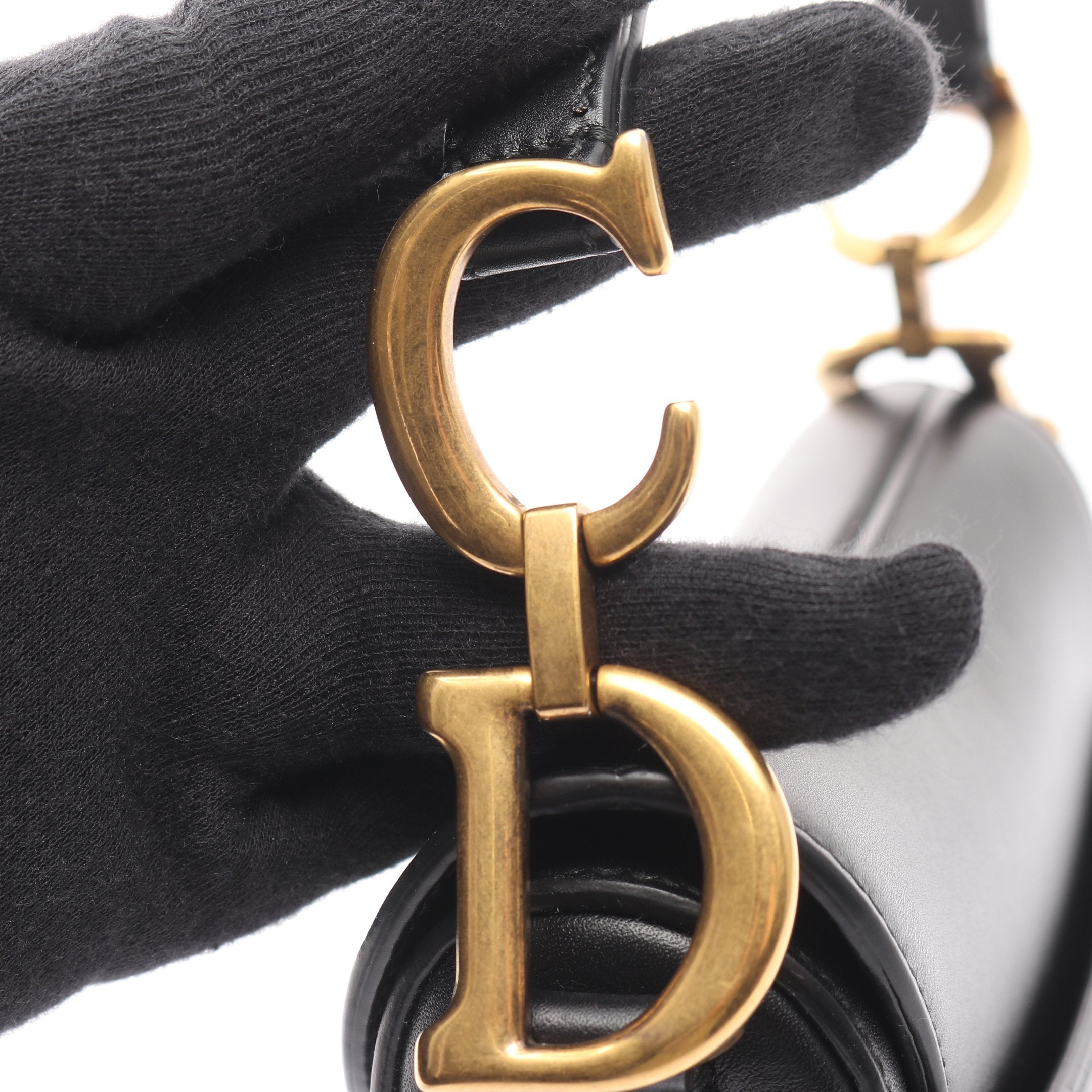 サドルバッグ ミニ ハンドバッグ レザー ブラック クリスチャン