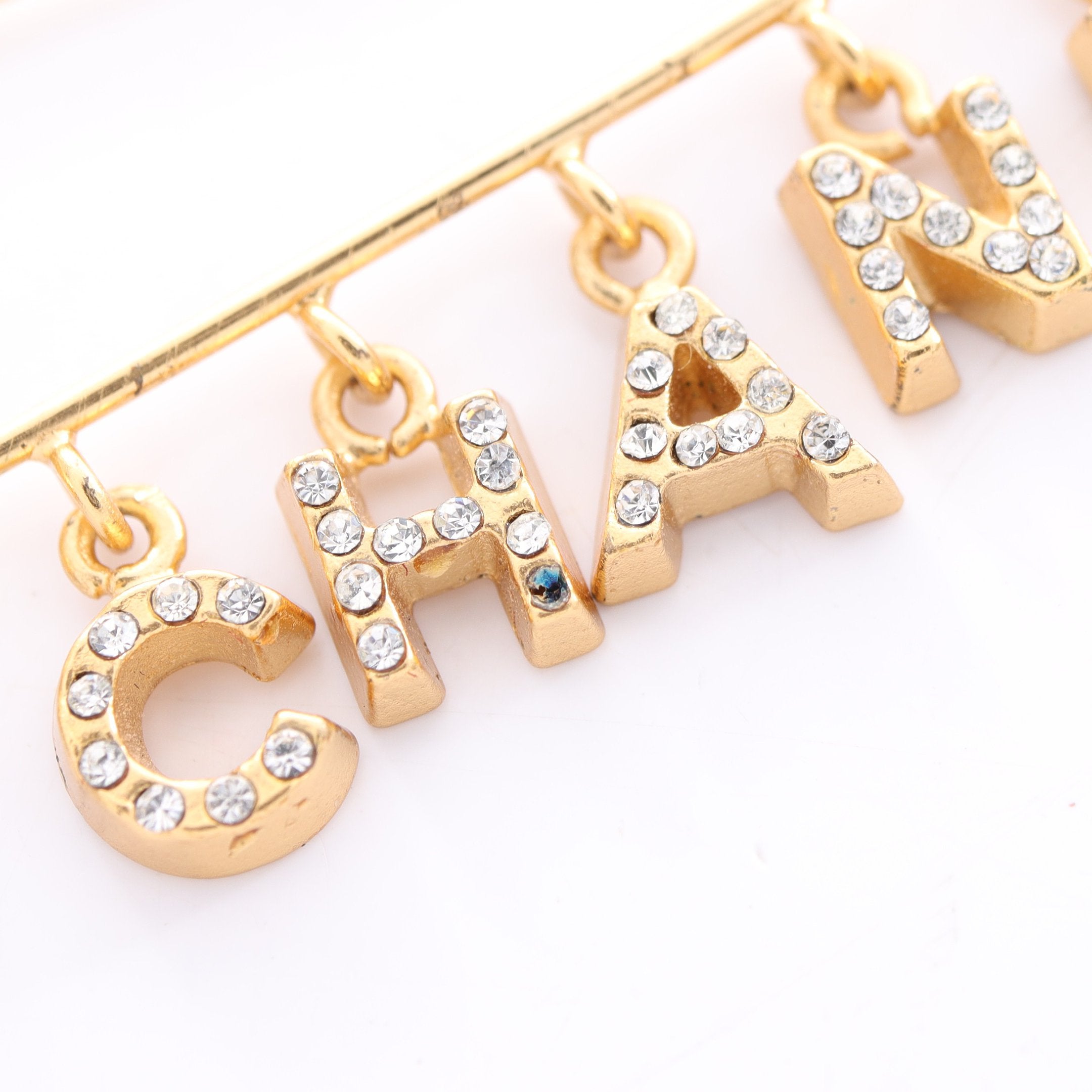 ココマーク ロゴ ブローチ GP ラインストーン ゴールド クリア 01P