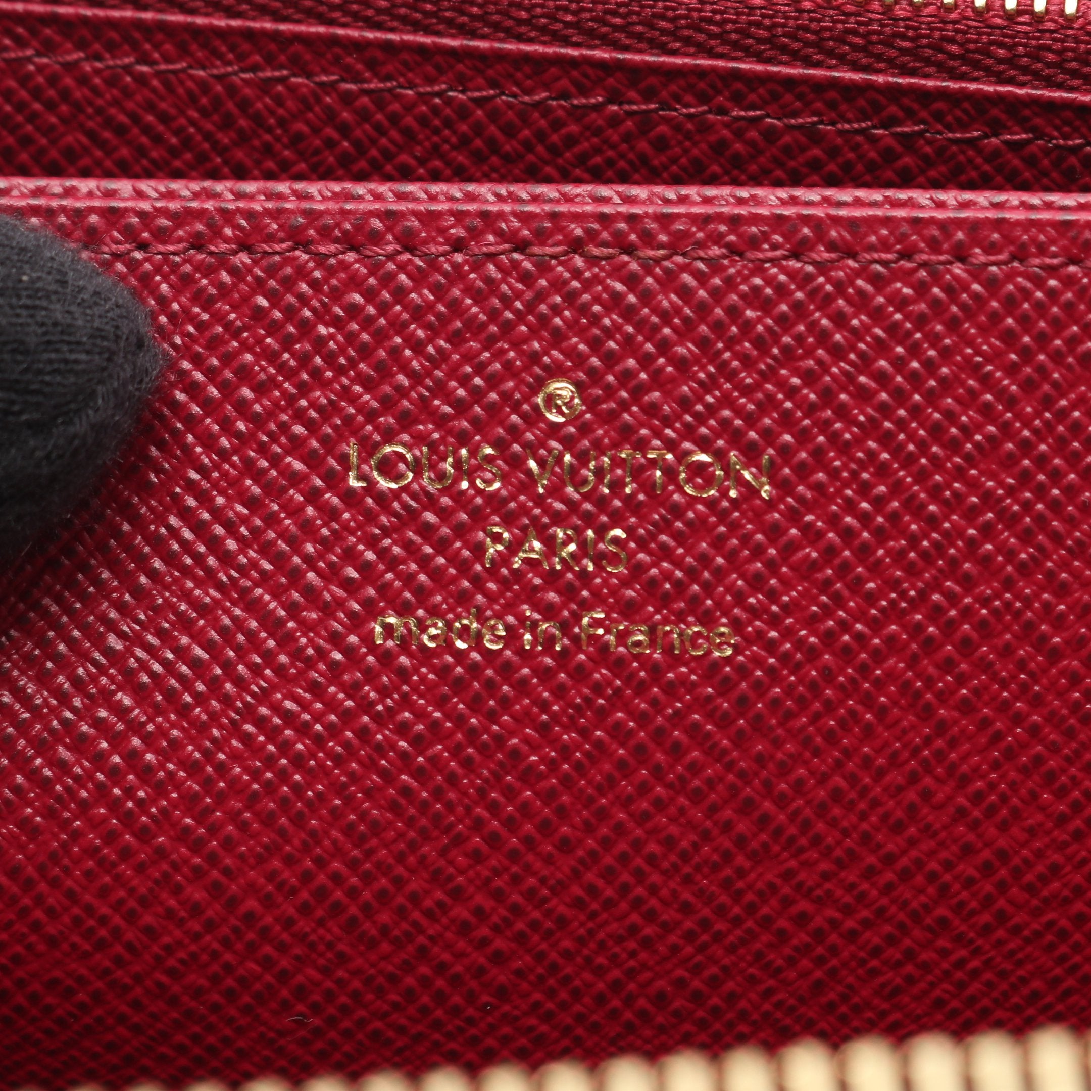 ジッピーウォレット モノグラム フューシャ ラウンドファスナー長財布