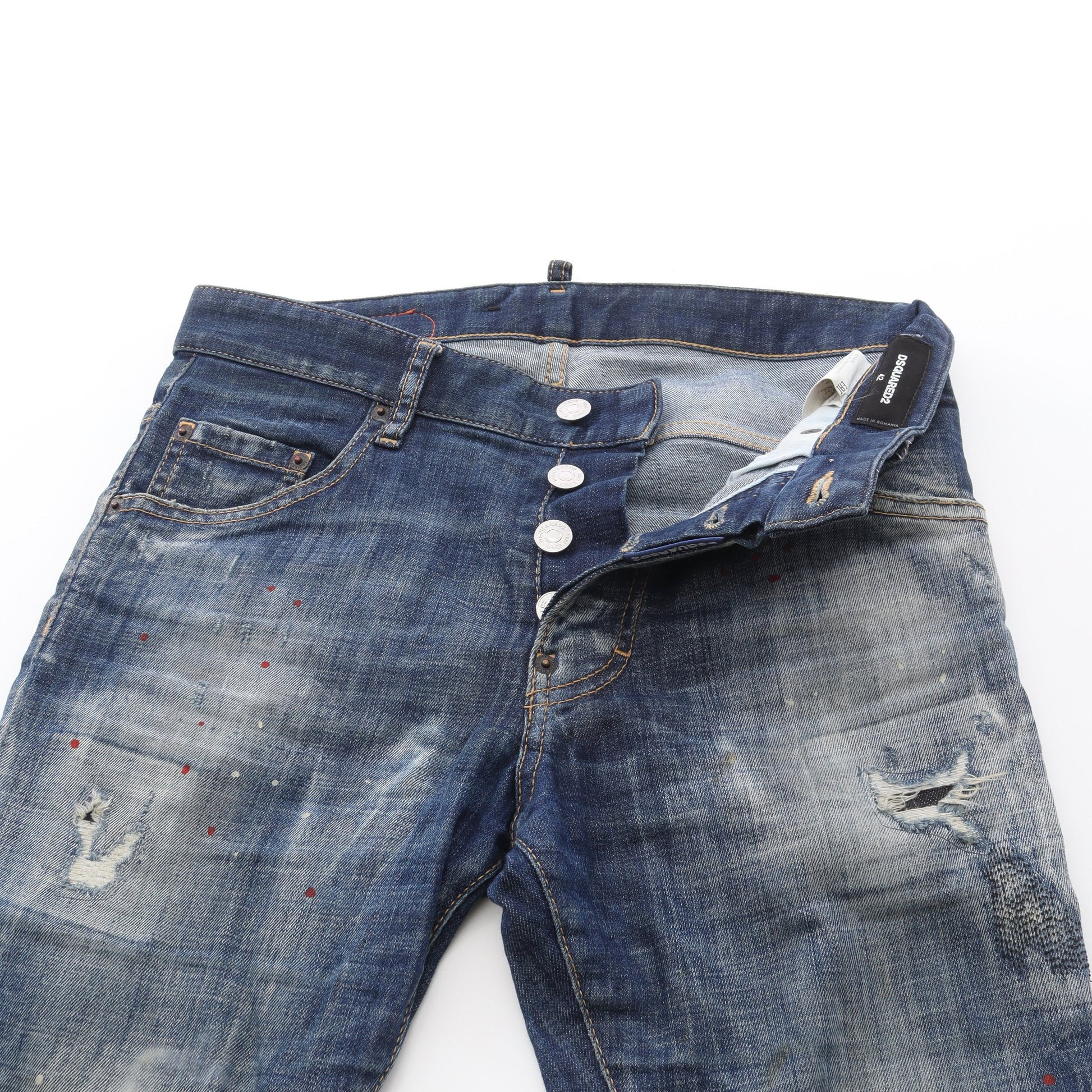 SKATER JEAN デニムパンツ ロゴワッペン コットン インディゴブルー ダメージ加工 ペイント加工 ボタンフライ ディースクエアード ボトムス DSQUARED2