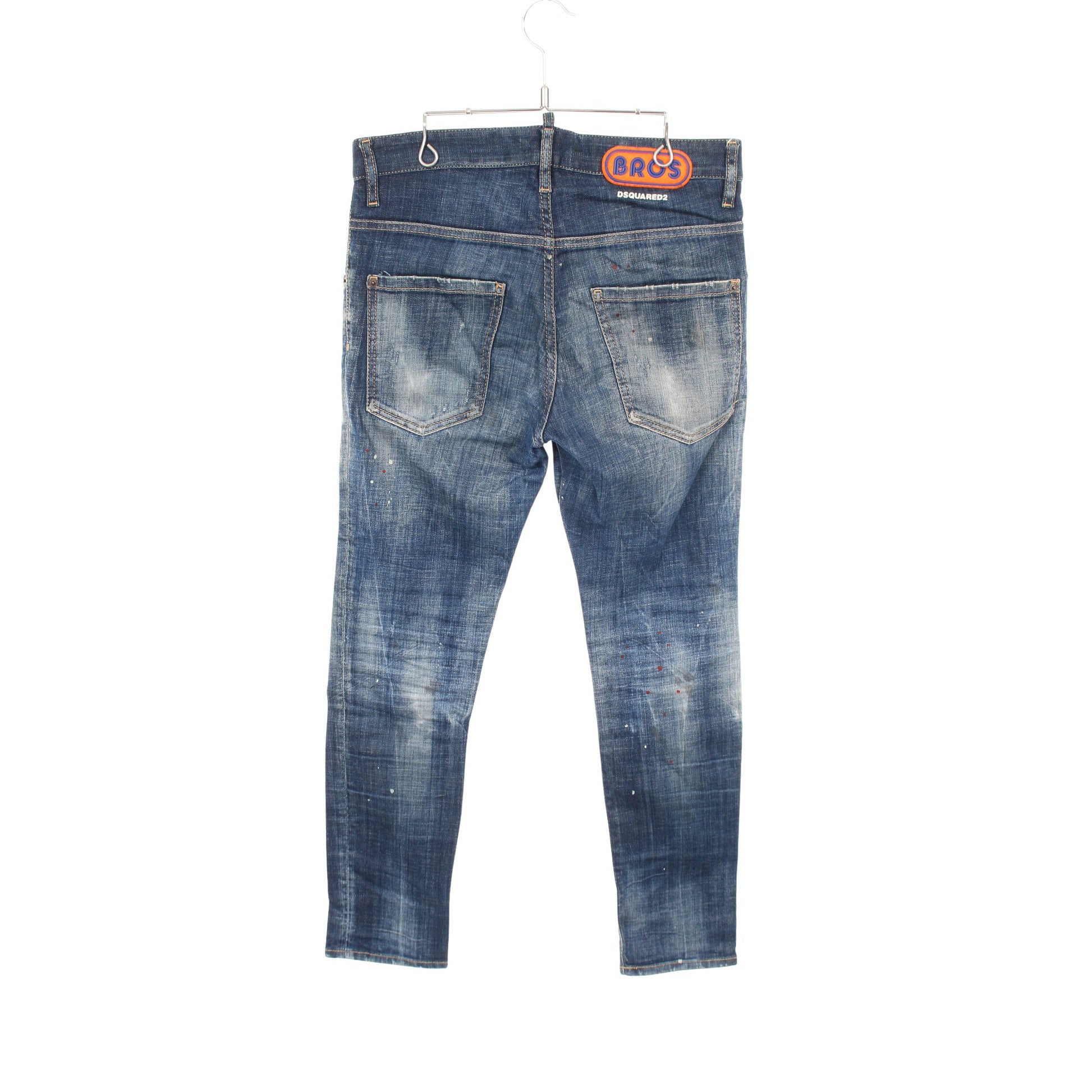 SKATER JEAN デニムパンツ ロゴワッペン コットン インディゴブルー ダメージ加工 ペイント加工 ボタンフライ ディースクエアード ボトムス DSQUARED2