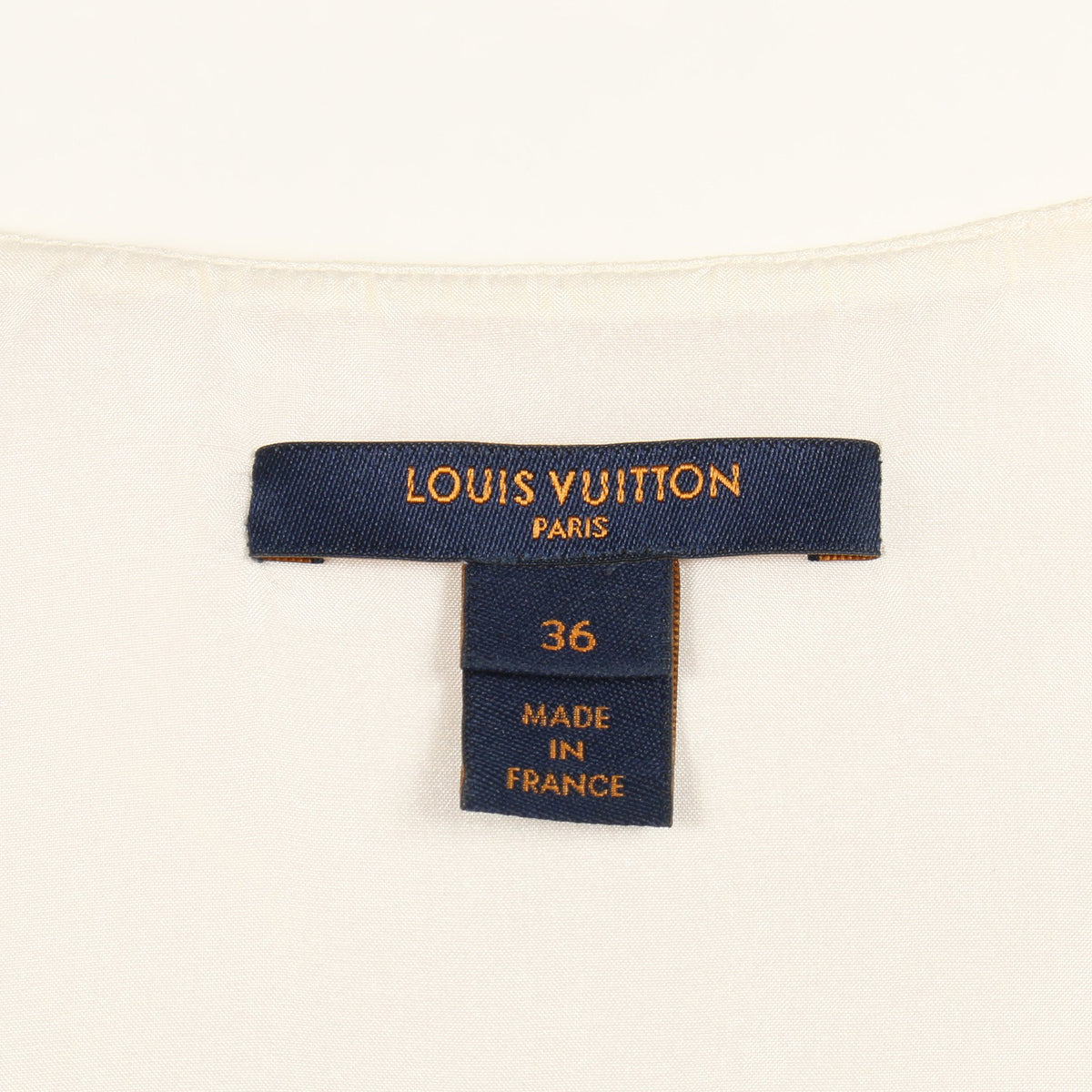 ワンピース ノーススリーブ シルク オフホワイト オレンジ ルイヴィトン ワンピース LOUIS VUITTON