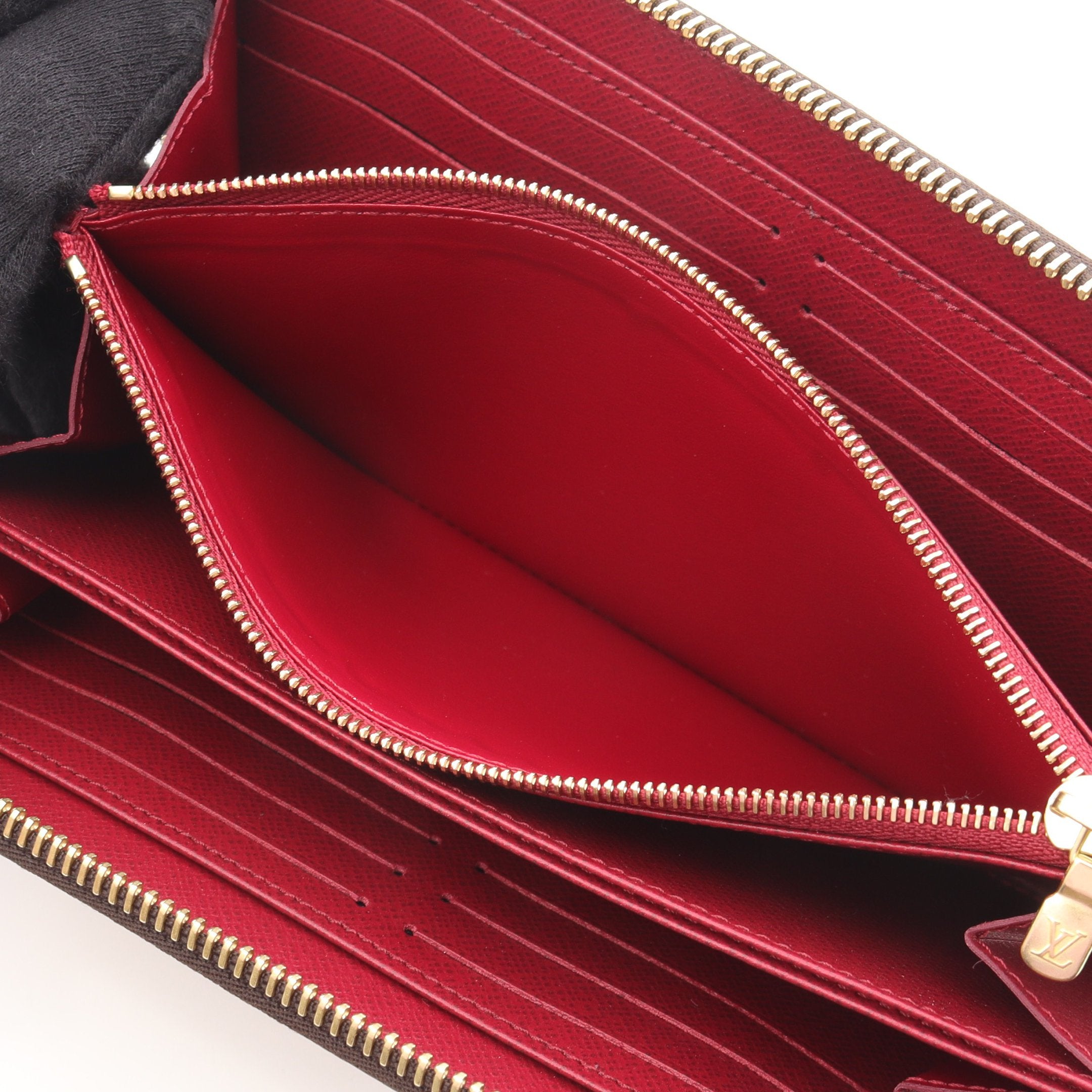 ジッピーウォレット モノグラム フューシャ ラウンドファスナー長財布