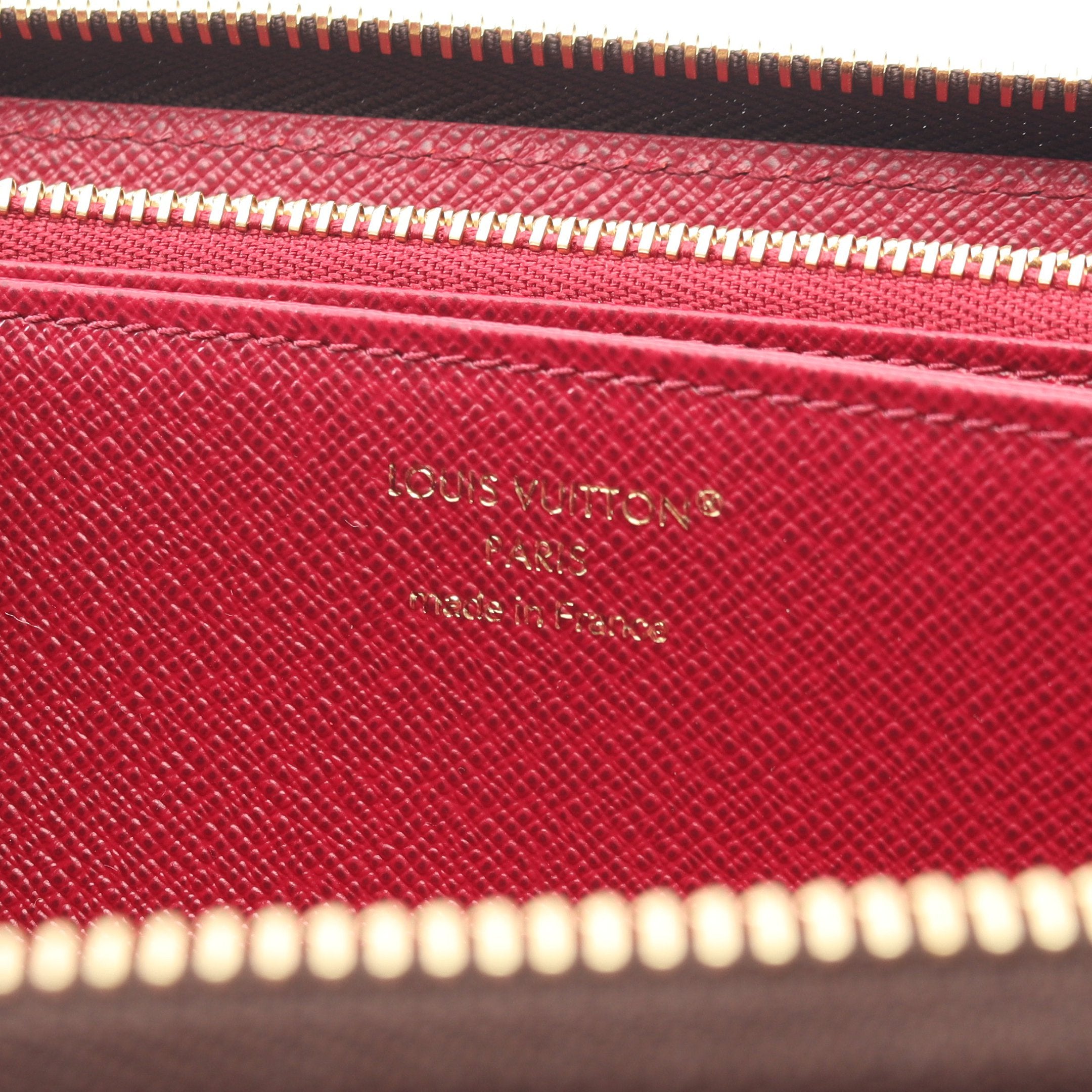 ジッピーウォレット モノグラム フューシャ ラウンドファスナー長財布