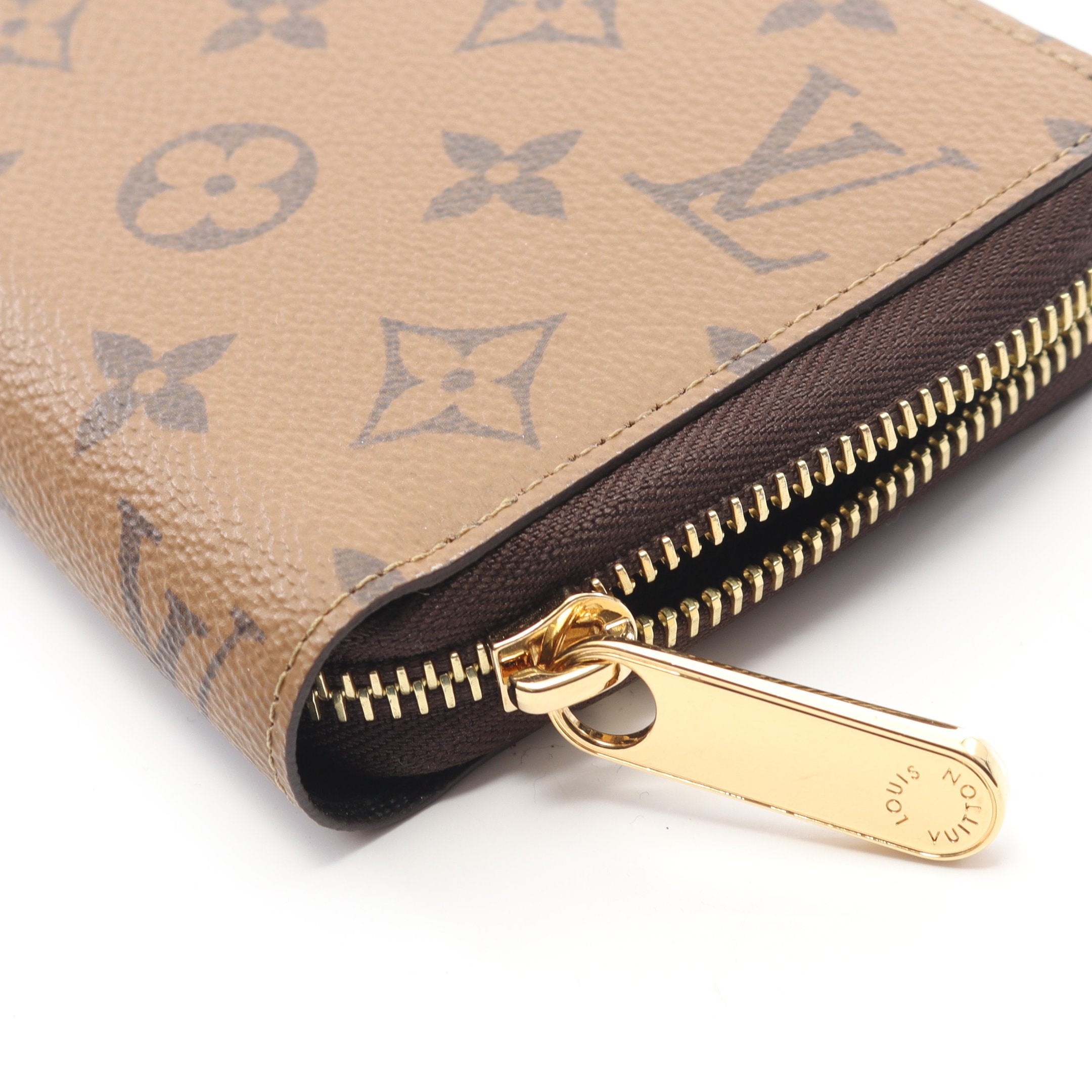 ジッピーウォレット モノグラムリバース ラウンドファスナー長財布 PVC