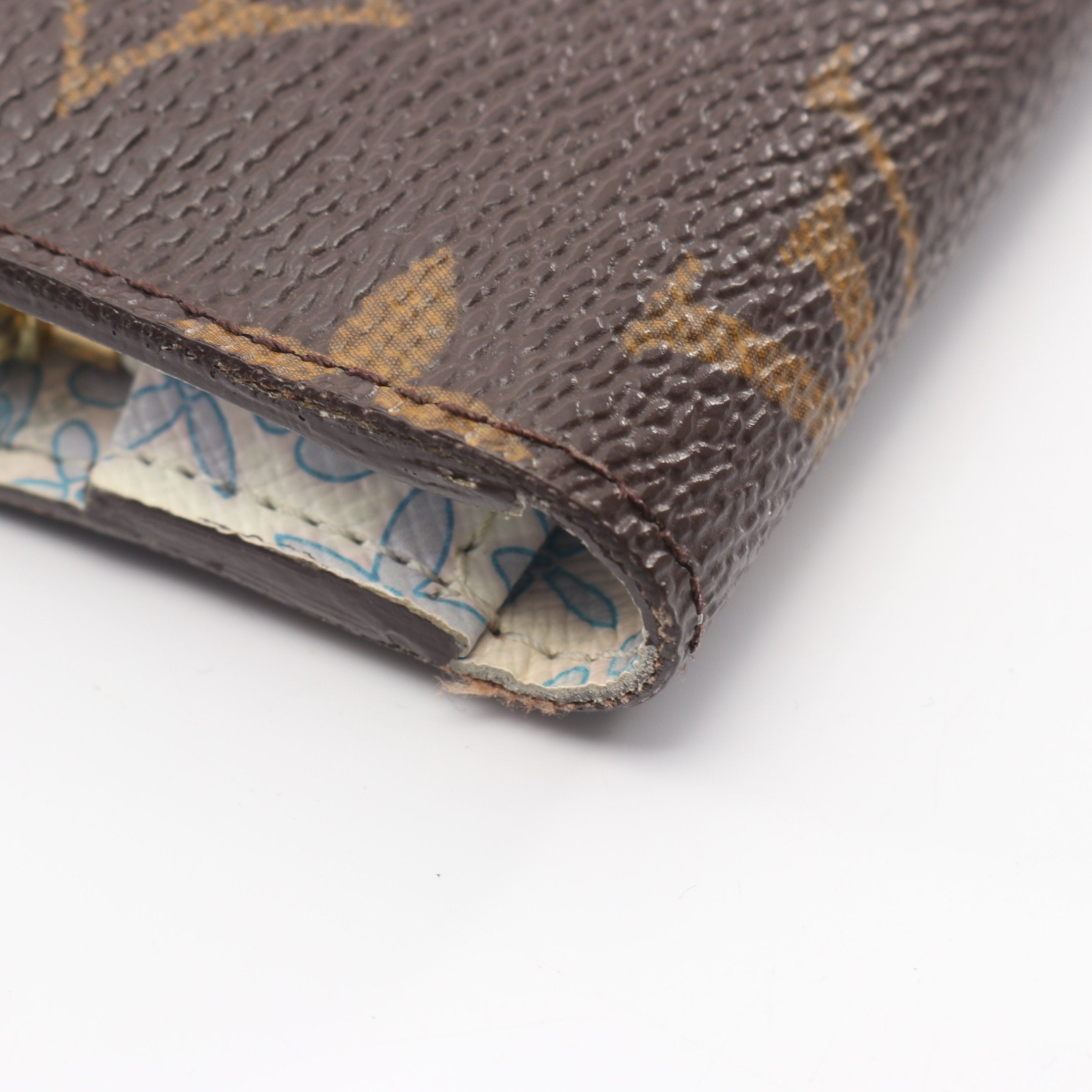 ポルトモネアンソリット モノグラムフルリ ヴィオレ 二つ折り財布