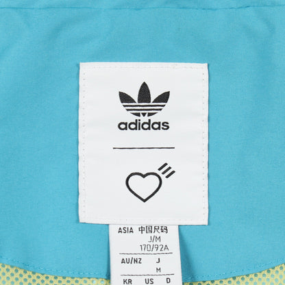 adidas × HUMAN MADE トラックジャケット ライトブルー イエロー フード付き アディダス アウター adidas
