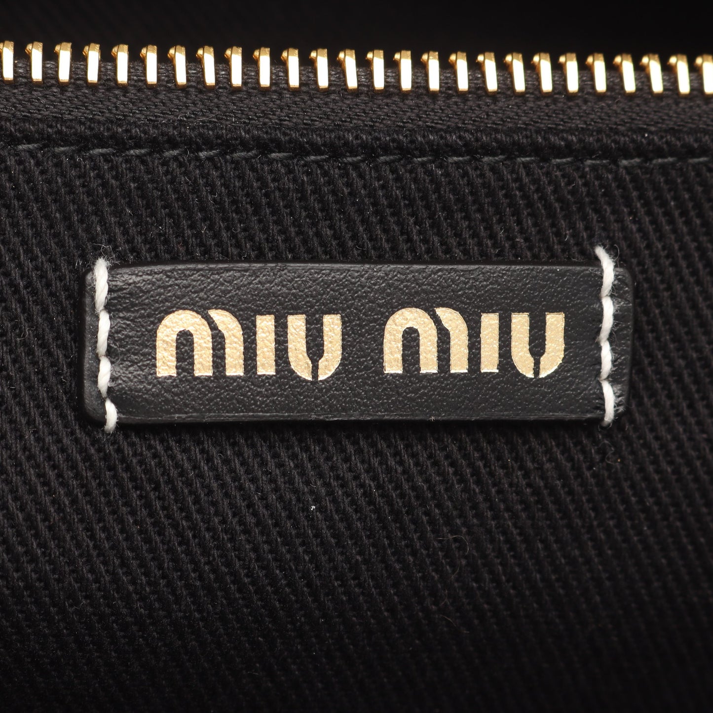 ロゴ ショルダーバッグ トートバッグ キャンバス レザー ホワイト ブラック ミュウミュウ バッグ miu miu