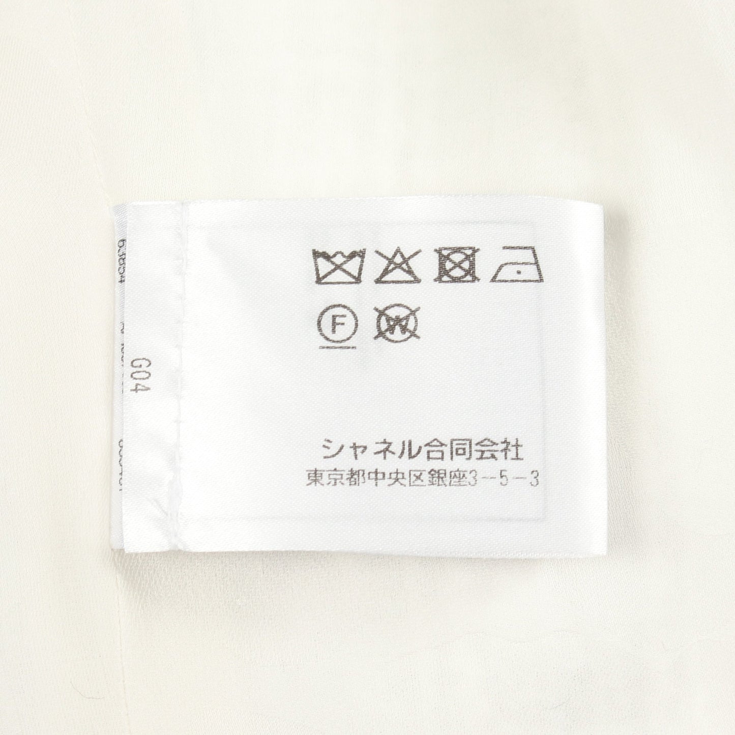 ココマークボタン ツイード ノーカラージャケット コットン オフホワイト シルバー シャネル アウター CHANEL