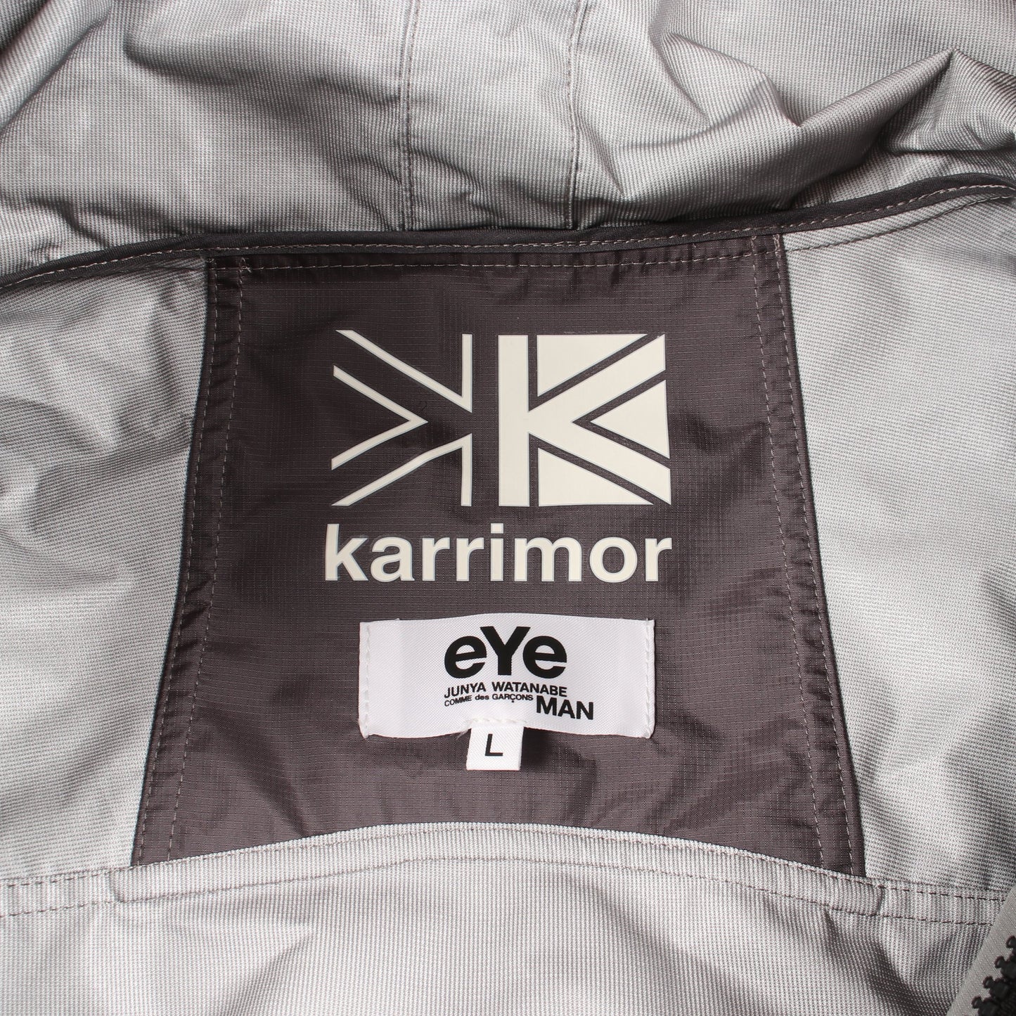 eYe COMME des GARCONS JUNYA WATANABE MAN × karrimor ナイロンリップラミネート ジャケット ナイロン ダークグレー グレー フード付き アイコムデギャルソンジュンヤワタナベマン アウター eYe COMME des GARCONS JUNYA WATANABE MAN