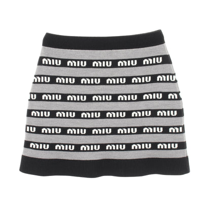 ミニ ニット スカート ロゴ ウール グレー ブラック ミュウミュウ ボトムス miu miu