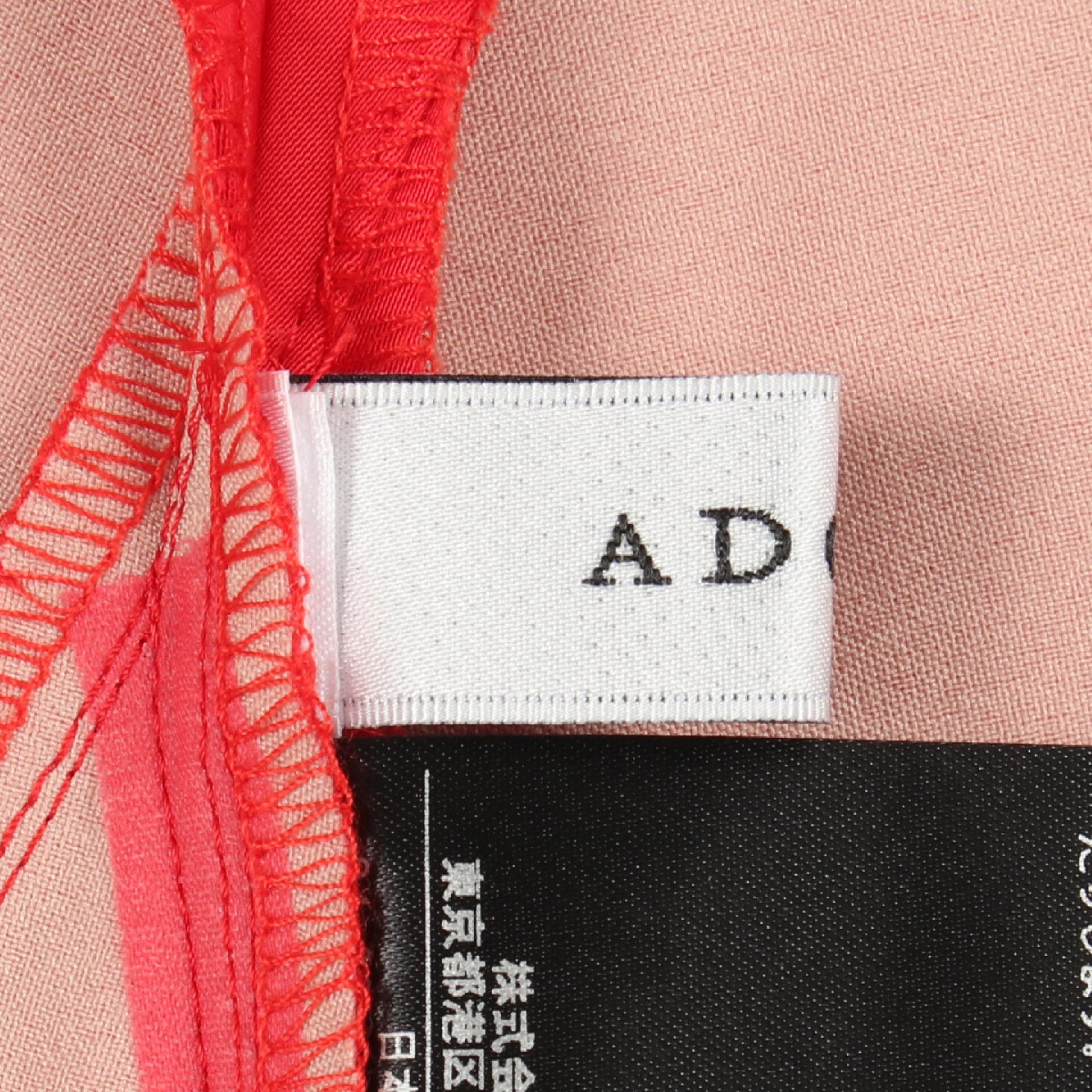 ブライトサテン ラップスカート レッド アドーア ボトムス ADORE
