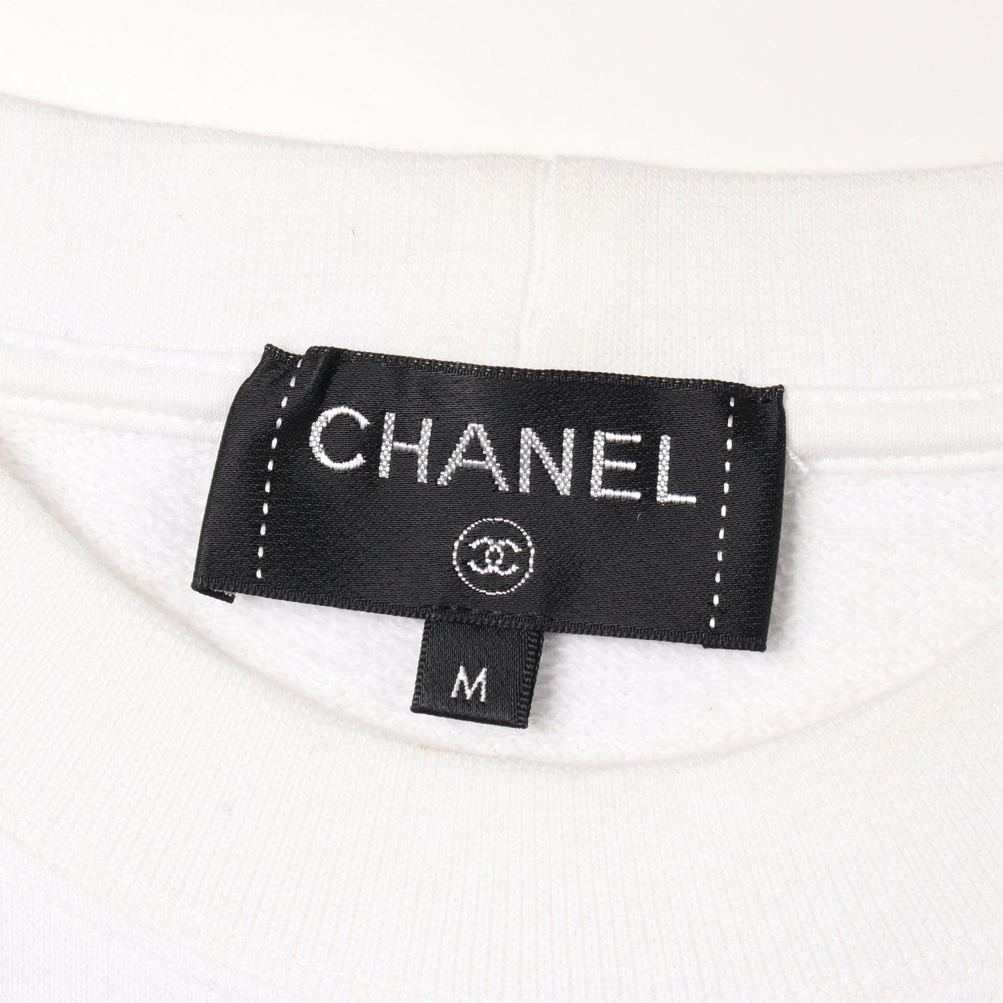ココマーク カメリヤ スウェットシャツ コットン ラインストーン スパンコール ホワイト ブラック シャネル トップス CHANEL