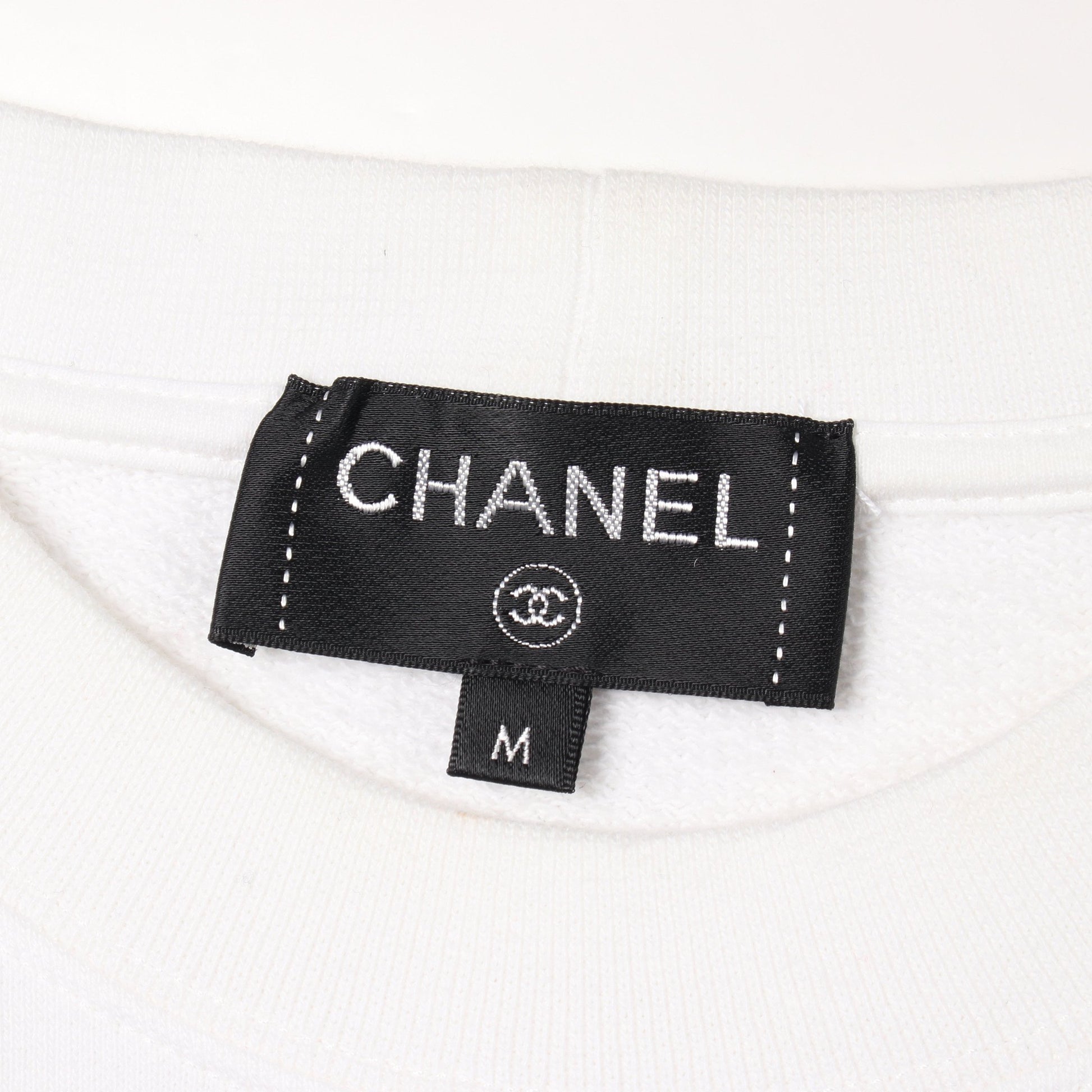 ココマーク カメリヤ スウェットシャツ コットン ラインストーン スパンコール ホワイト ブラック シャネル トップス CHANEL
