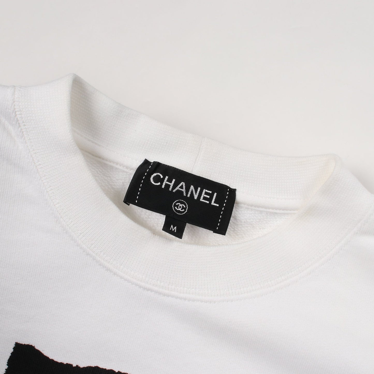 ココマーク カメリヤ スウェットシャツ コットン ラインストーン スパンコール ホワイト ブラック シャネル トップス CHANEL