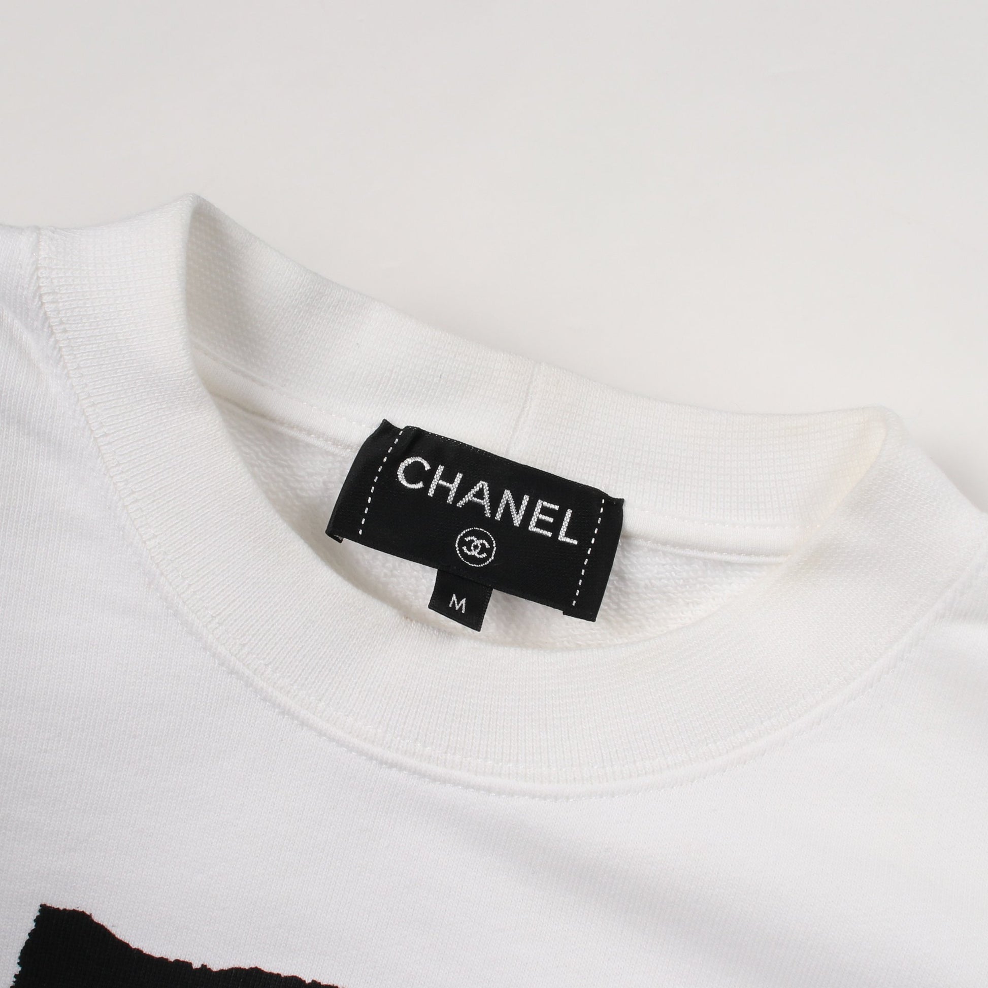 ココマーク カメリヤ スウェットシャツ コットン ラインストーン スパンコール ホワイト ブラック シャネル トップス CHANEL