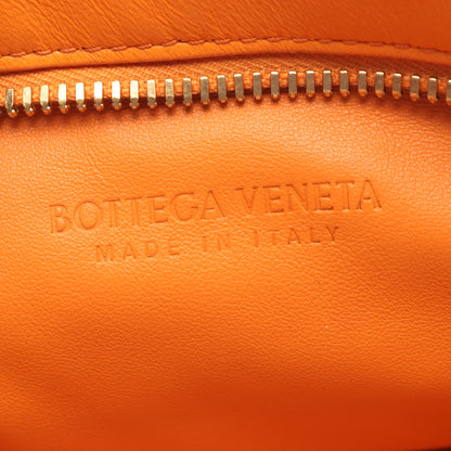 BVツイスト イントレチャート ハンドバッグ レザー オレンジ ボッテガヴェネタ バッグ BOTTEGA VENETA