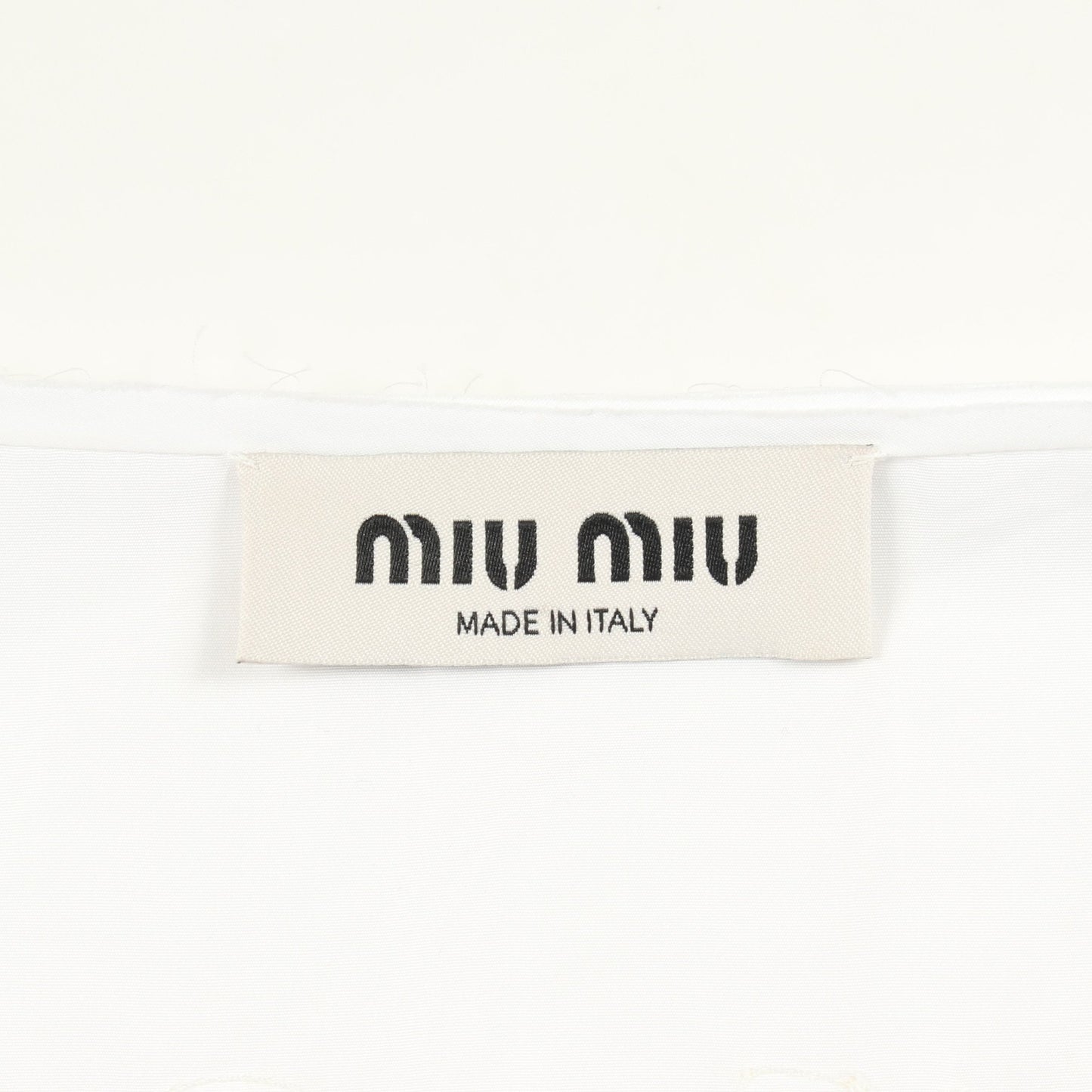 カットオフ クロップドシャツ ブラウス コットン ホワイト ミュウミュウ トップス miu miu