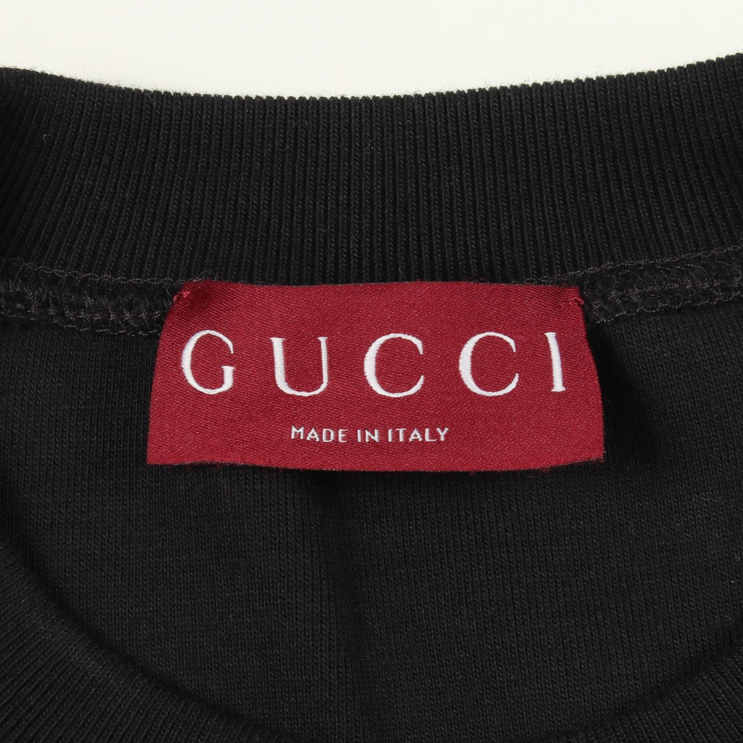 エンボスロゴ スウェットシャツ コットン ブラック グッチ トップス GUCCI
