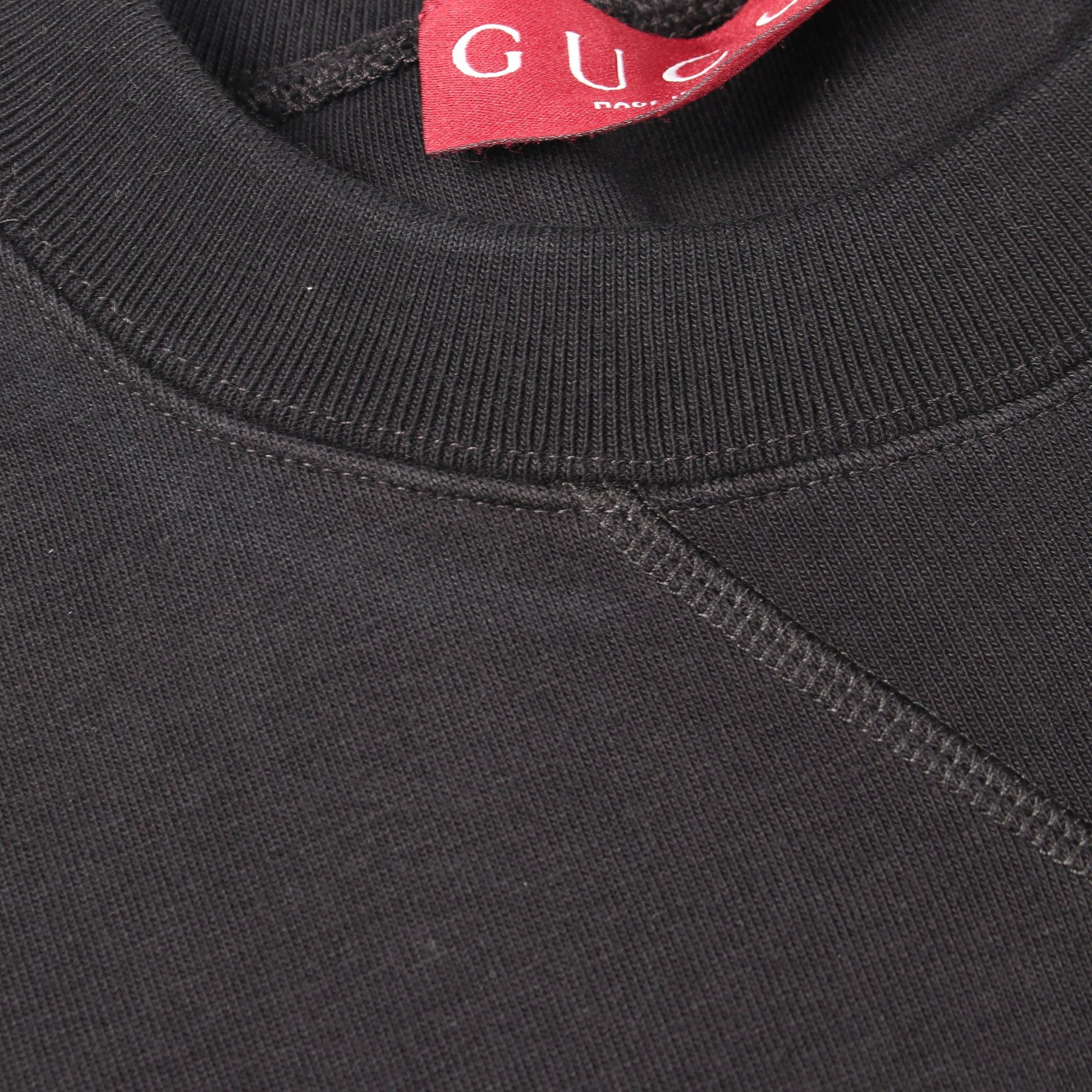 エンボスロゴ スウェットシャツ コットン ブラック グッチ トップス GUCCI