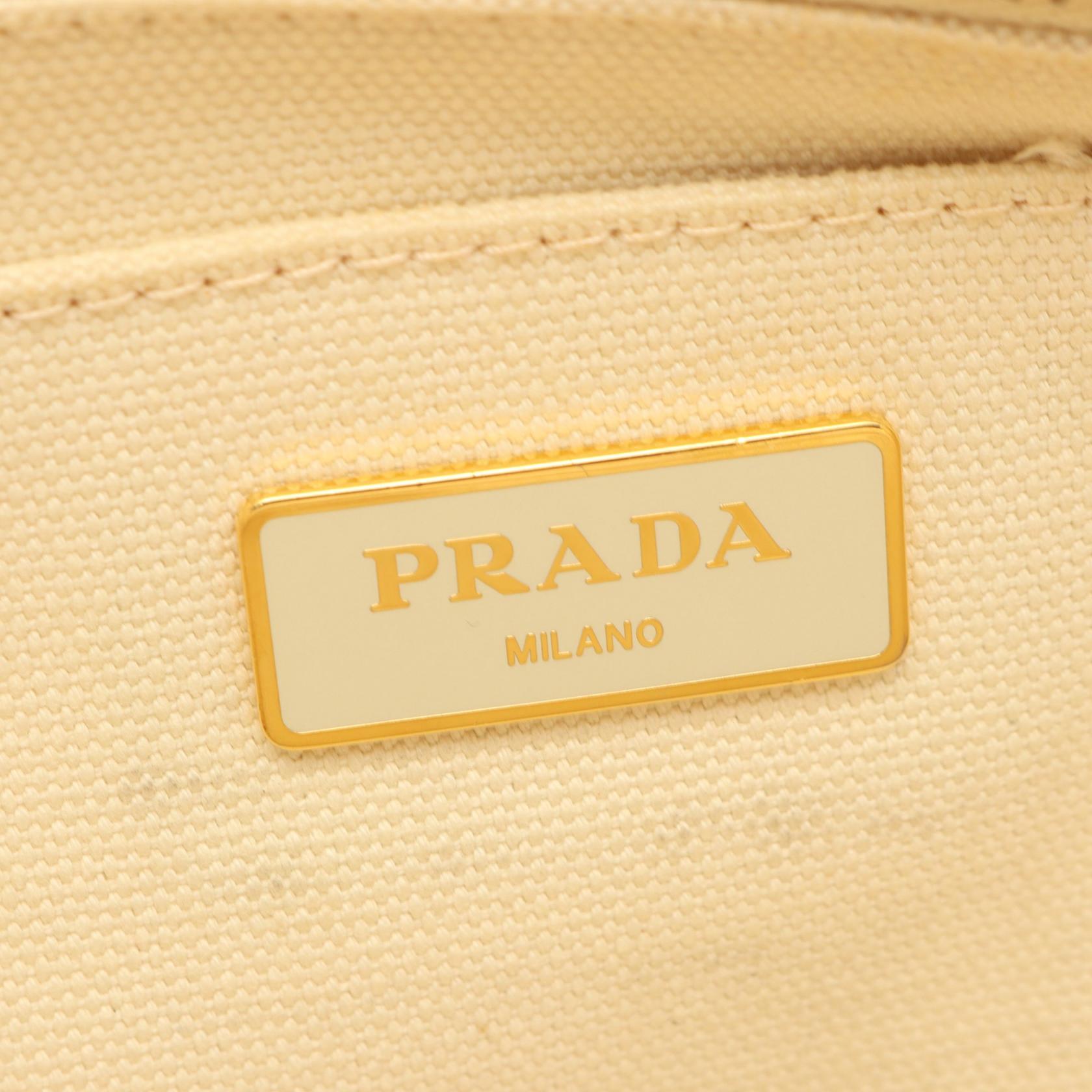カナパ ハンドバッグ トートバッグ キャンバス オフホワイト プラダ バッグ PRADA