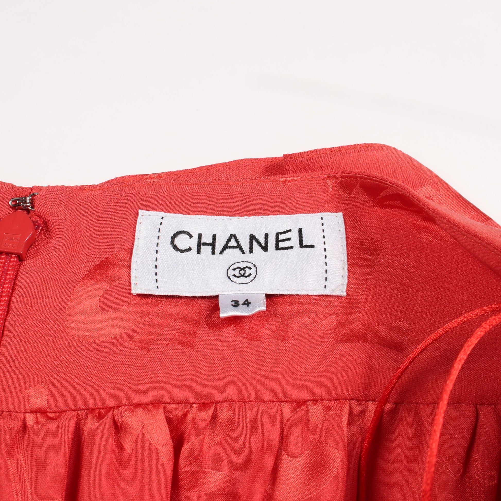 ロゴ フリル スカート シルク オレンジレッド シャネル ボトムス CHANEL