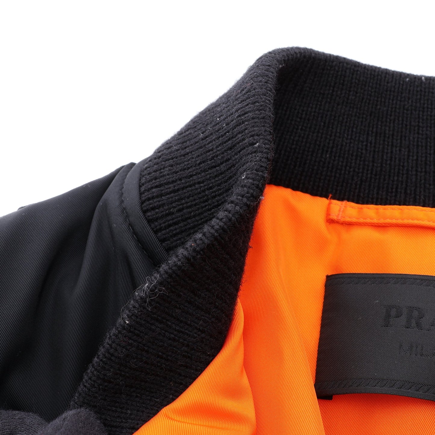 Re-Nylon 三角プレート ブルゾン ボンバージャケット ナイロン ブラック プラダ