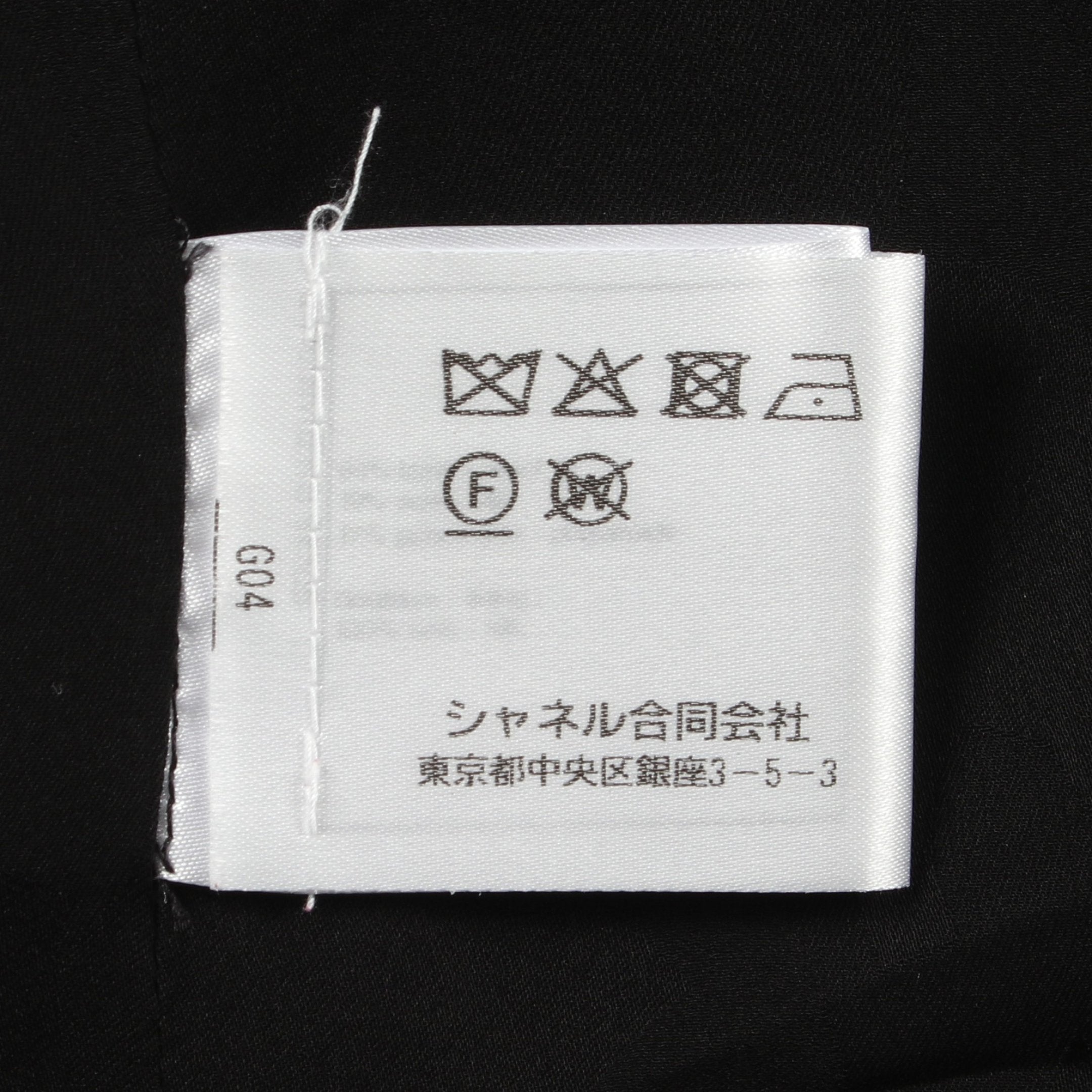新品同様　シャネル　ココマークボタン　チェーン　ウール　シルク　07Pジャケット ココンマークボタン エンボス総柄 ノーカラージャケット ウール シルク